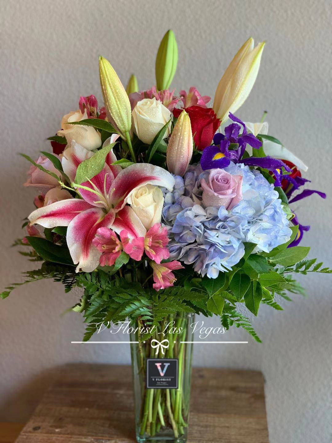 Radiant Dreams - Express your love with the selection of roses with lilies and Hydrangeas joined together.  Colors and selections are based on seasons, Colors of flowers are subject to change with a similar color frame.