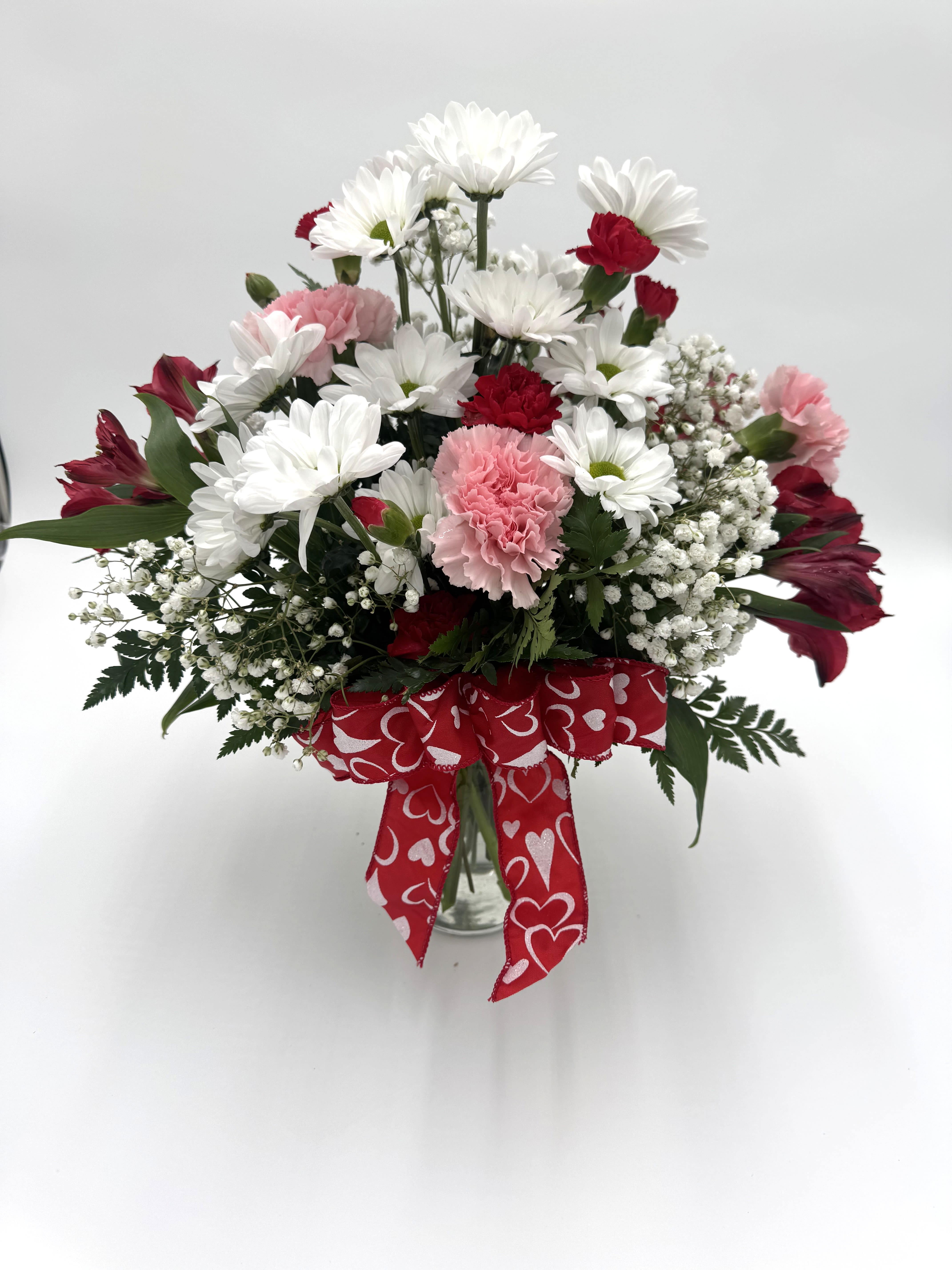 Be Mine Bouquet - Delicate pinks, classic reds, and fresh whites come together in this charming vase arrangement tied with a Valentine’s ribbon