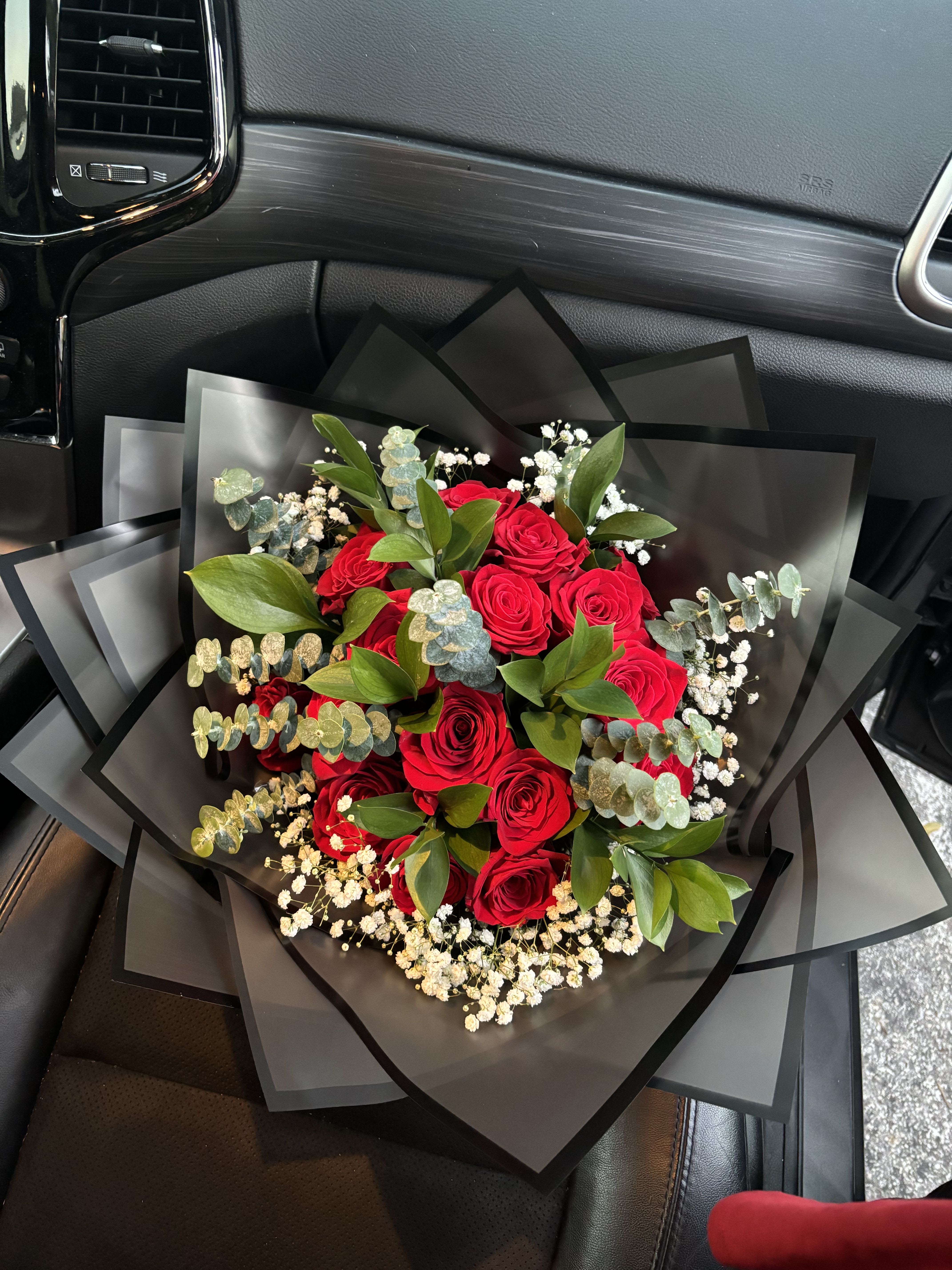 12 Rose Eucalyptus Bouquet - Roses &amp; Eucalyptus  Arrangement you receive may not be 100% the same as photo, appearance will vary due to uncontrollable details such as product and seasonal availability. We will substitute with the best choices to match or surpass the value of your order. Please remember flowers are sensitive to temperature, to ensure they last as long as possible, proper care is needed. Each order includes a food packet with your order, recipient must remember to change water and trim stems every other day to ensure a long lasting arrangement.