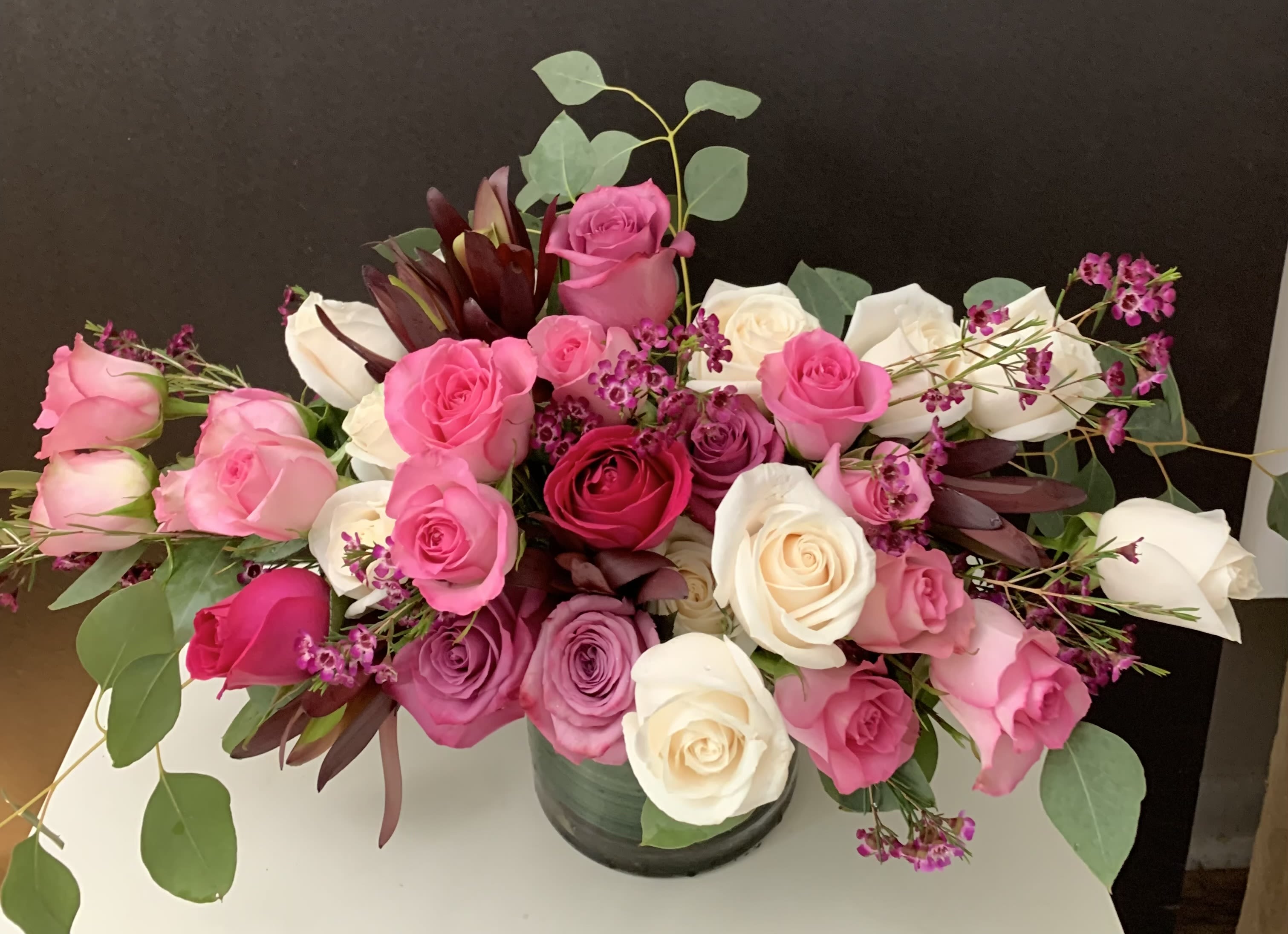 Shining Roses  - Roses, Eucalyptus in glass vase 
