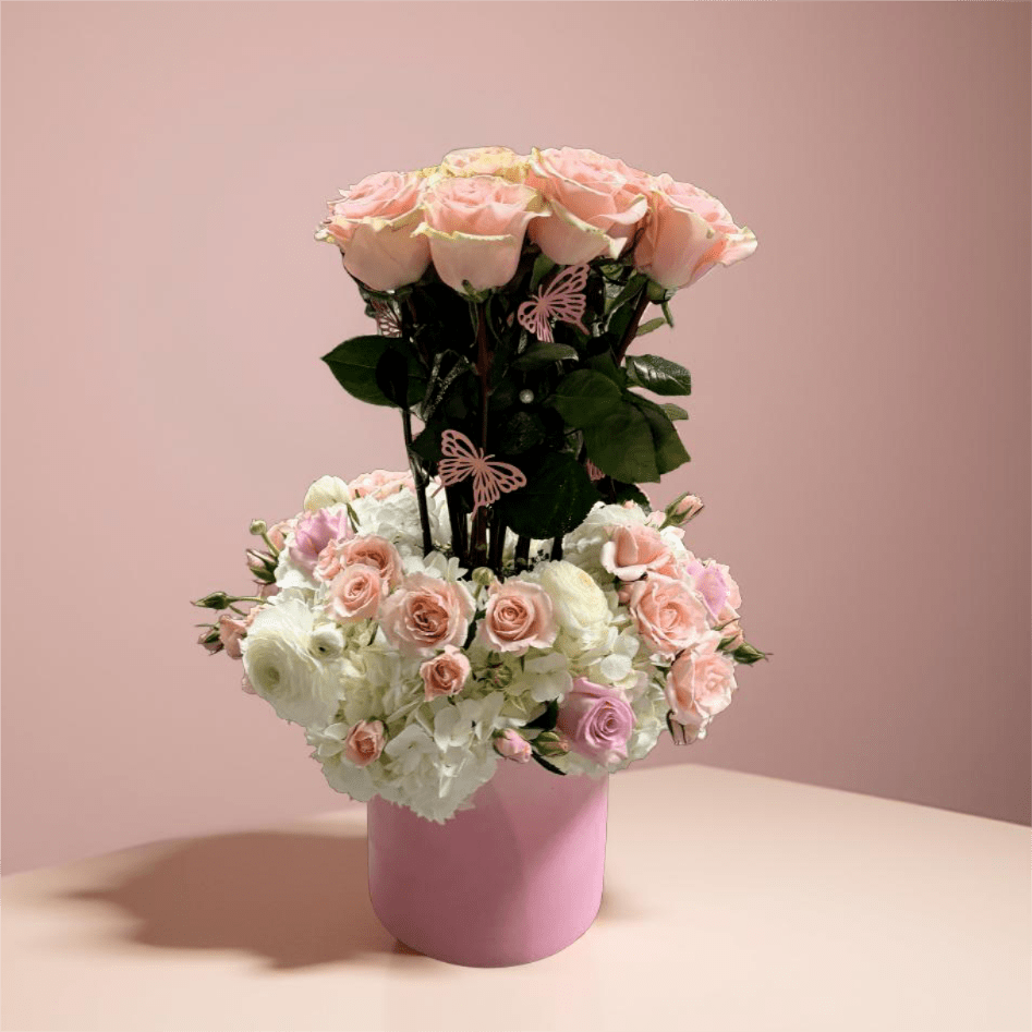Blush Butterfly Garden - Soft roses and pastel blooms gathered with butterfly details. Designsd for moments that deserve something truly special.