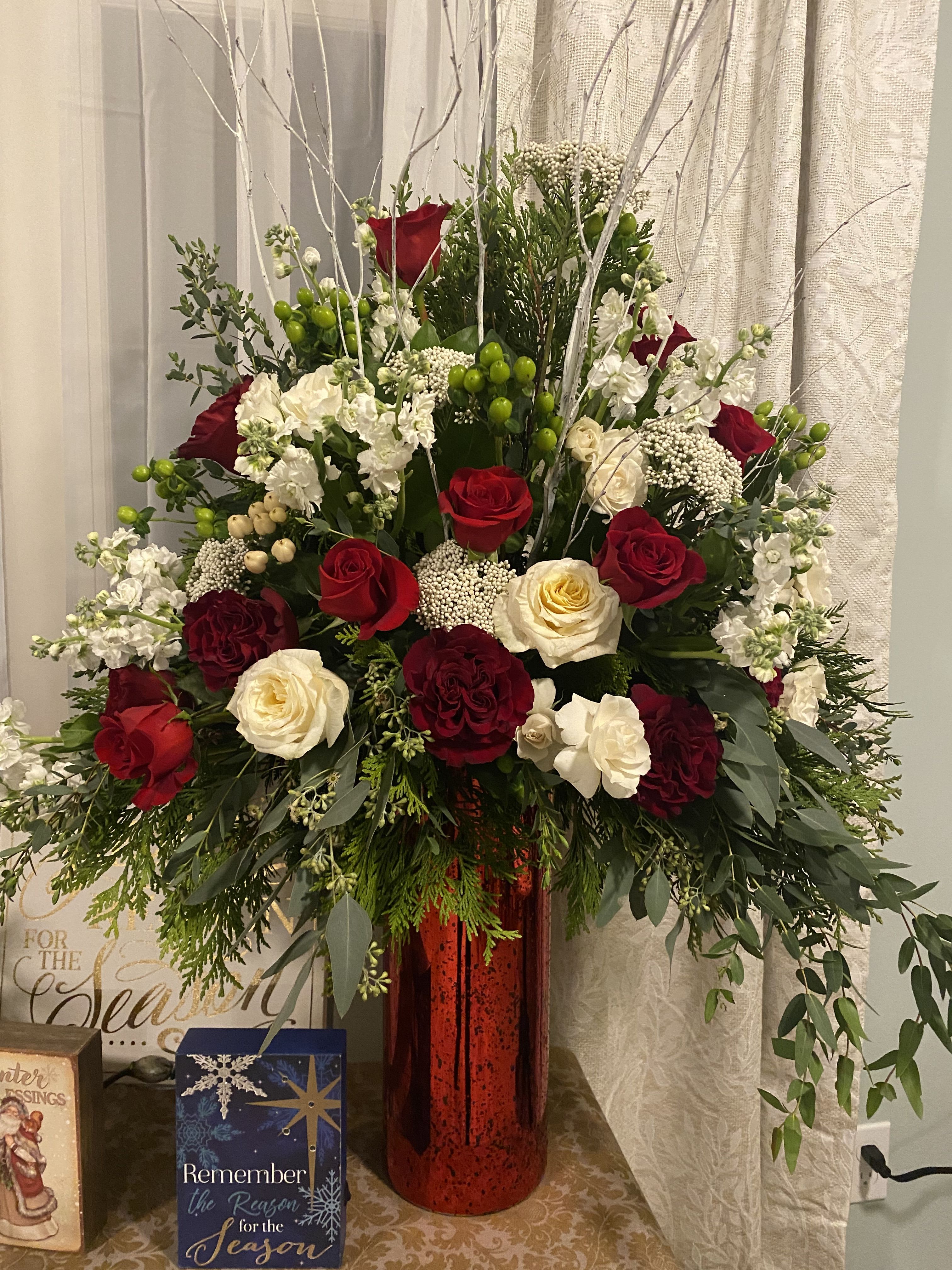 Love is in the Air - A metallic vase filled with a variety of extra long, beautiful roses, stock, hypericum and beautiful filler and greenery 