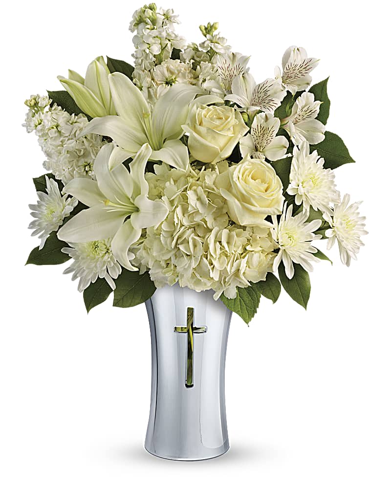 Shining Spirit Bouquet - A shining tribute to a life well lived, this pure white bouquet of hydrangea and lilies is arranged in a beautiful ceramic vase with gleaming metallized finish and reverent cross cut-out. It's a lovely gift of remembrance for the home or service.