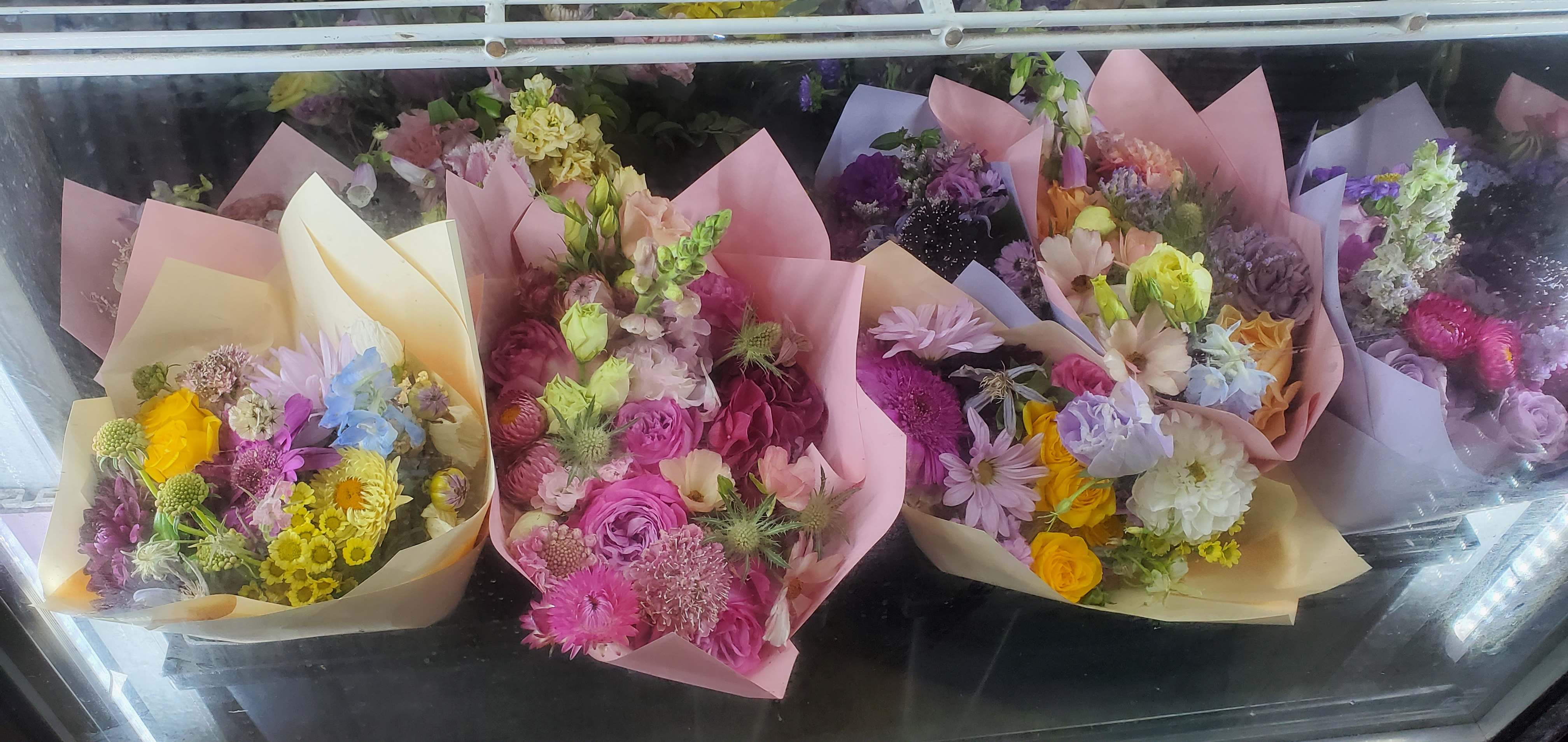 Assorted handwrapped bouquet - Handwrapped bouquet with high end flowers. Various color scheme