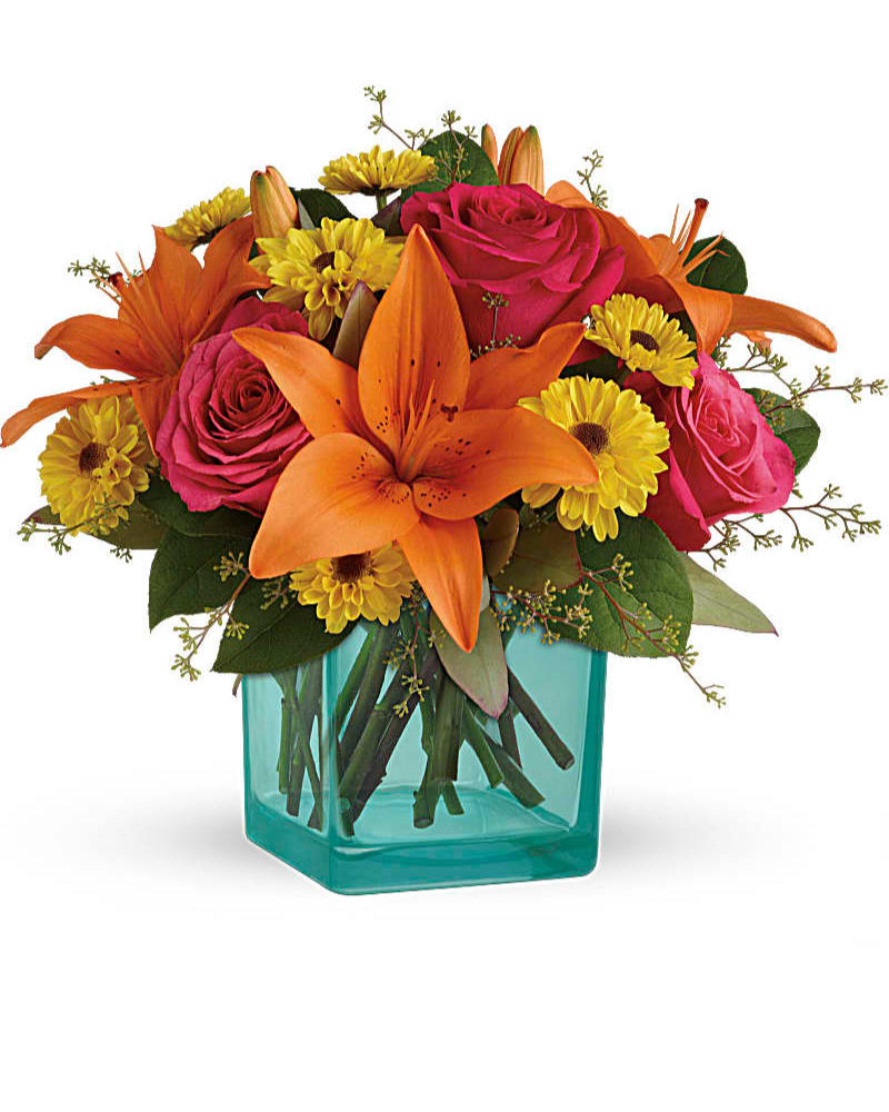 Siesta Bouquet - Make any day feel like a fiesta with these fabulous flowers! Hand-delivered in a stylish turquoise cube vase for the perfect contrast, these fun fuchsia roses and bright orange lilies are instant mood-lifters!