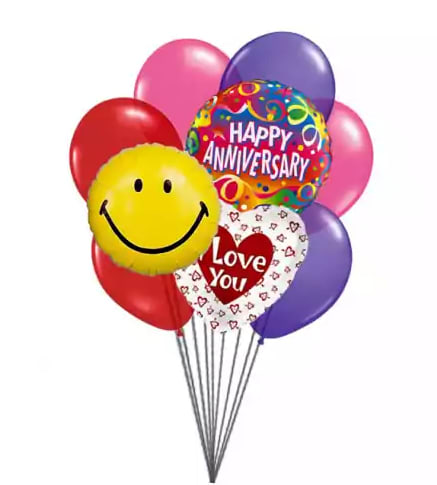 Happy Anniversary Balloon Bouquet - Four Mylar Balloons with 7 Latex Balloons. Mylar balloons may not be the exact ones that are pictured. Deluxe and Premium will include more mylar and latex balloons. Arrangement will include a balloon weight.