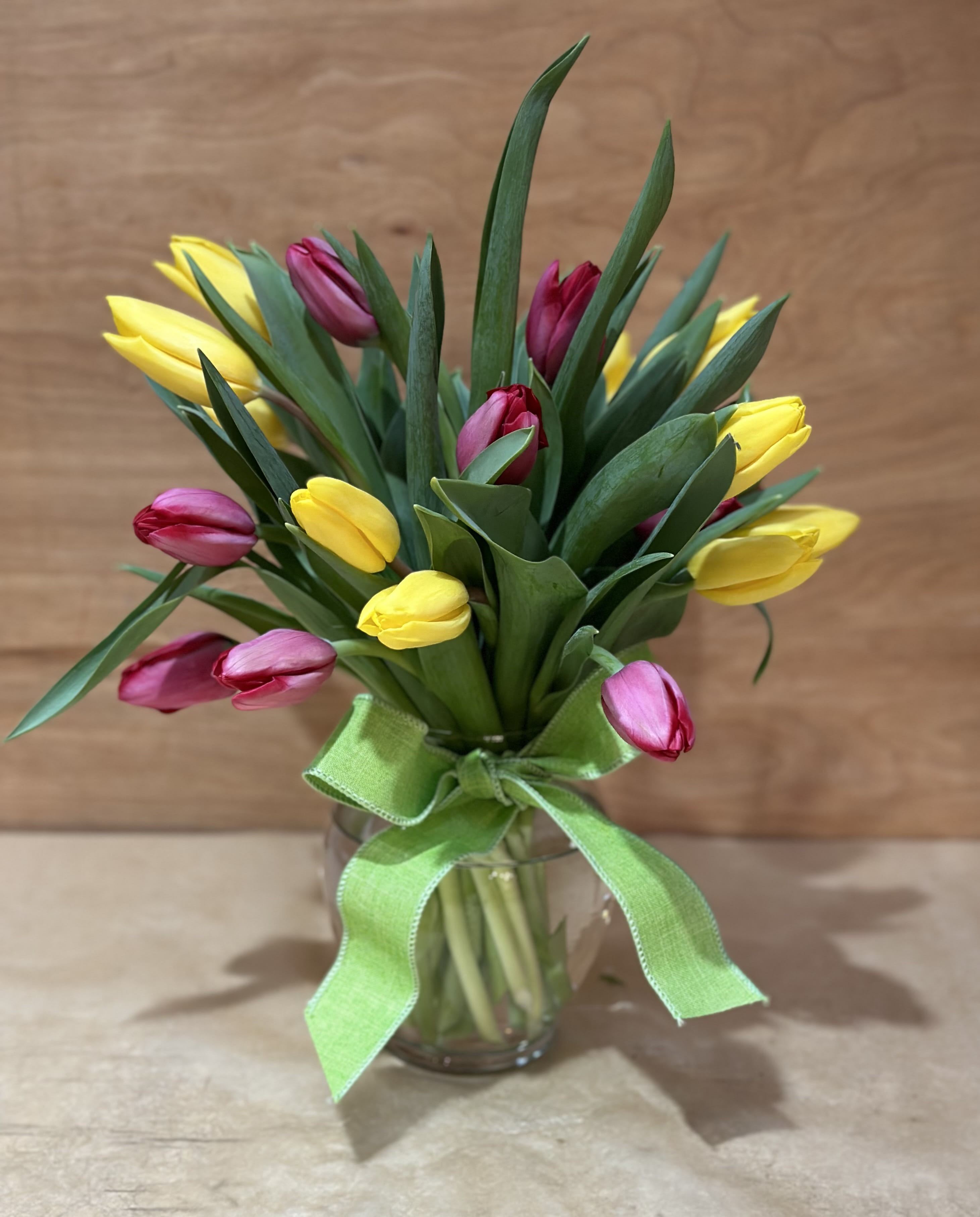Tulips  - Warm your heart this winter by bringing  spring into your home during these colder months .  Colorful mix of 20 tulips in a vase .   Colors will vary 