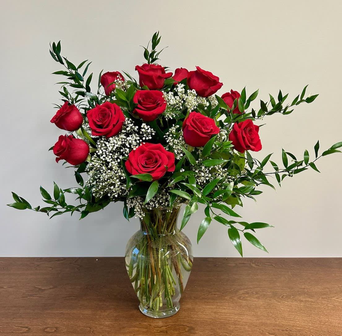 Dozen Rose Arrangement - We use premium long-stem Ecuadorian Roses for our Dozen rose arrangements, available in the following colors: Red, light pink, hot pink, lavender, yellow, white or mixed color