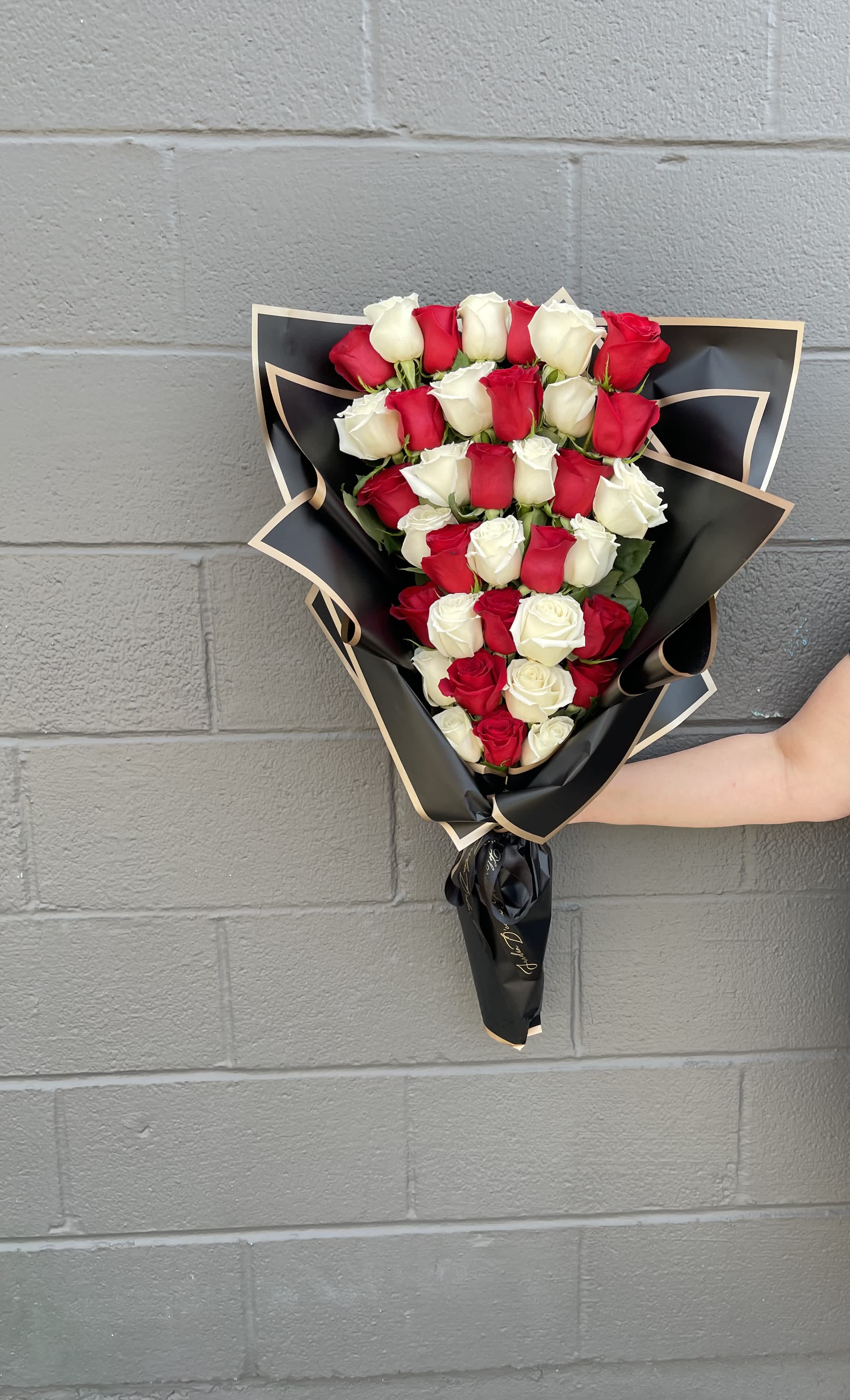 the 36 rose Luxury stack bouquet  - 36 beautiful long stem roses placed stacked and carefully wrapped in korean wrap paper 