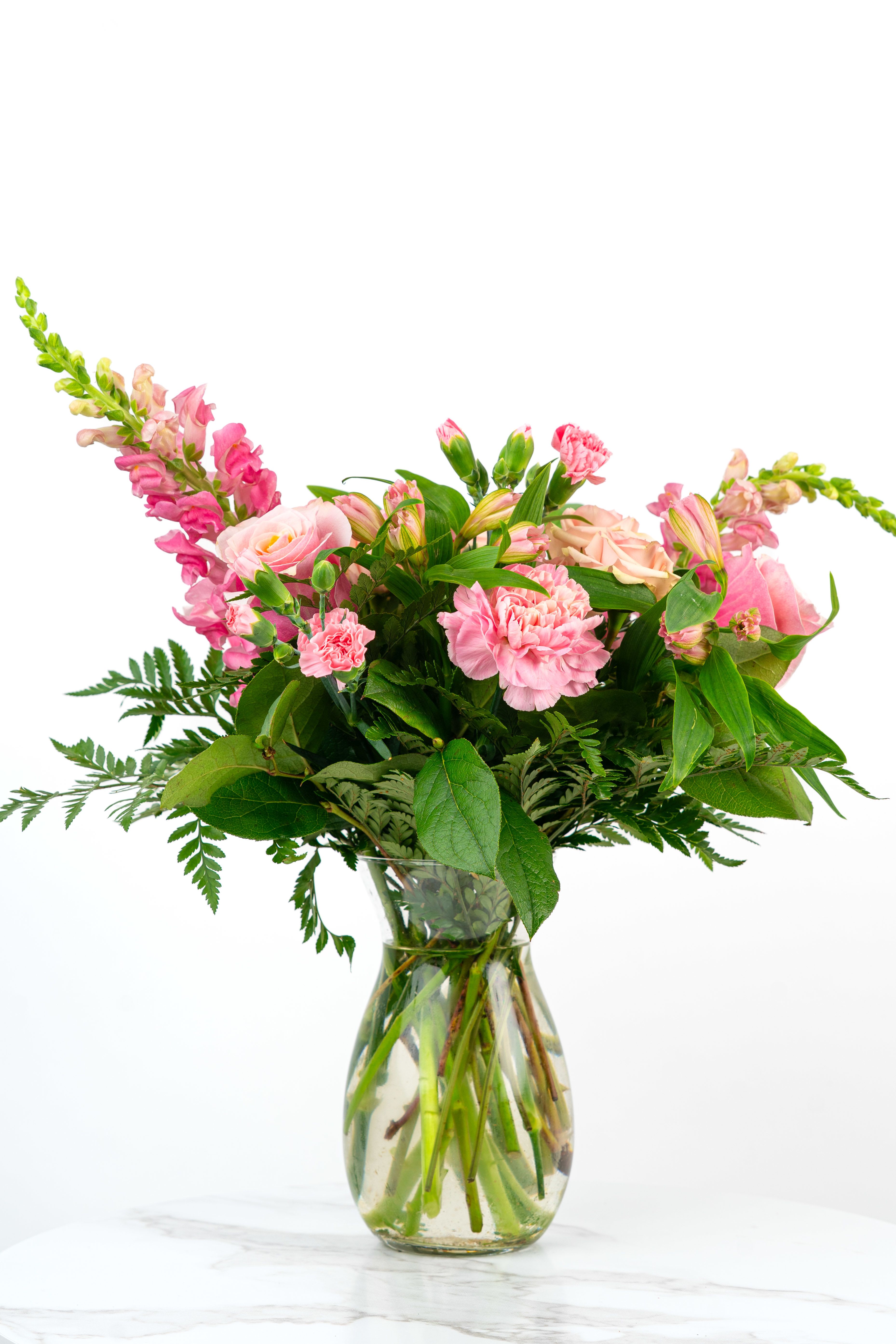 Our Sweetheart Collection: Pink Blooms - Our Sweetheart Collection blends shades of pink into romantic arrangements that express love, charm, and heartfelt sentiment. This is perfect for celebrating someone special with feminine color combinations. At Schultz Floral, each arrangement is one of a kind and styled just for your order. Because we always use the freshest blooms, your final arrangement may not look exactly as pictured due to bloom variations and availability.