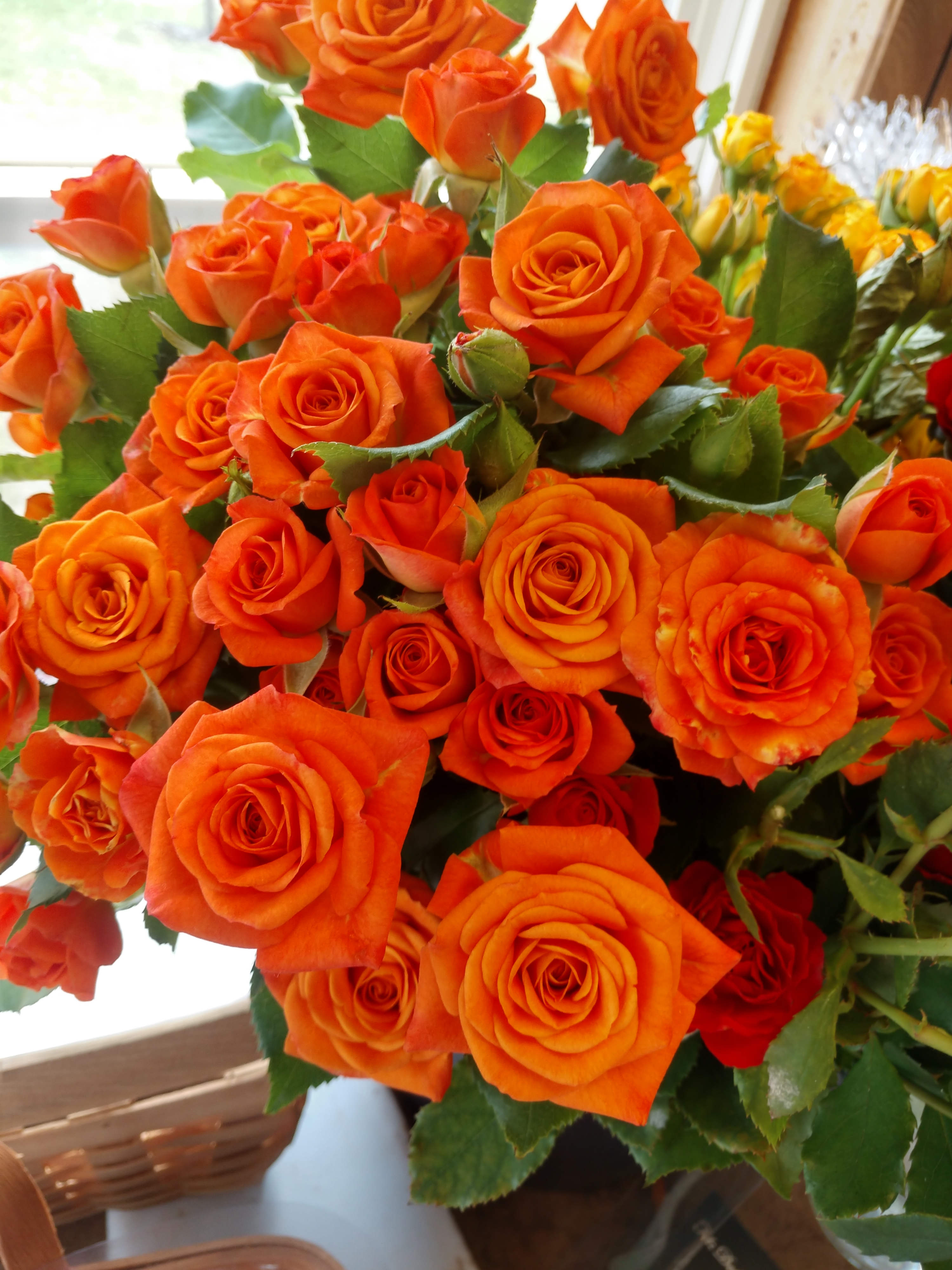 Orange Rose Boutonniere - A designers choice boutonniere of orange spray roses, add as many accessories as you wish!