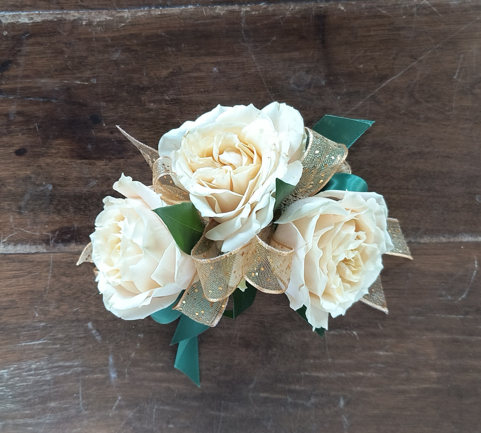 Champagne Taste Wrist Corsage - A vintage and almost antique color spray rose says, "I have Champagne Taste" Very simple and classic look. Wrist corsage includes elastic disposable bracelet