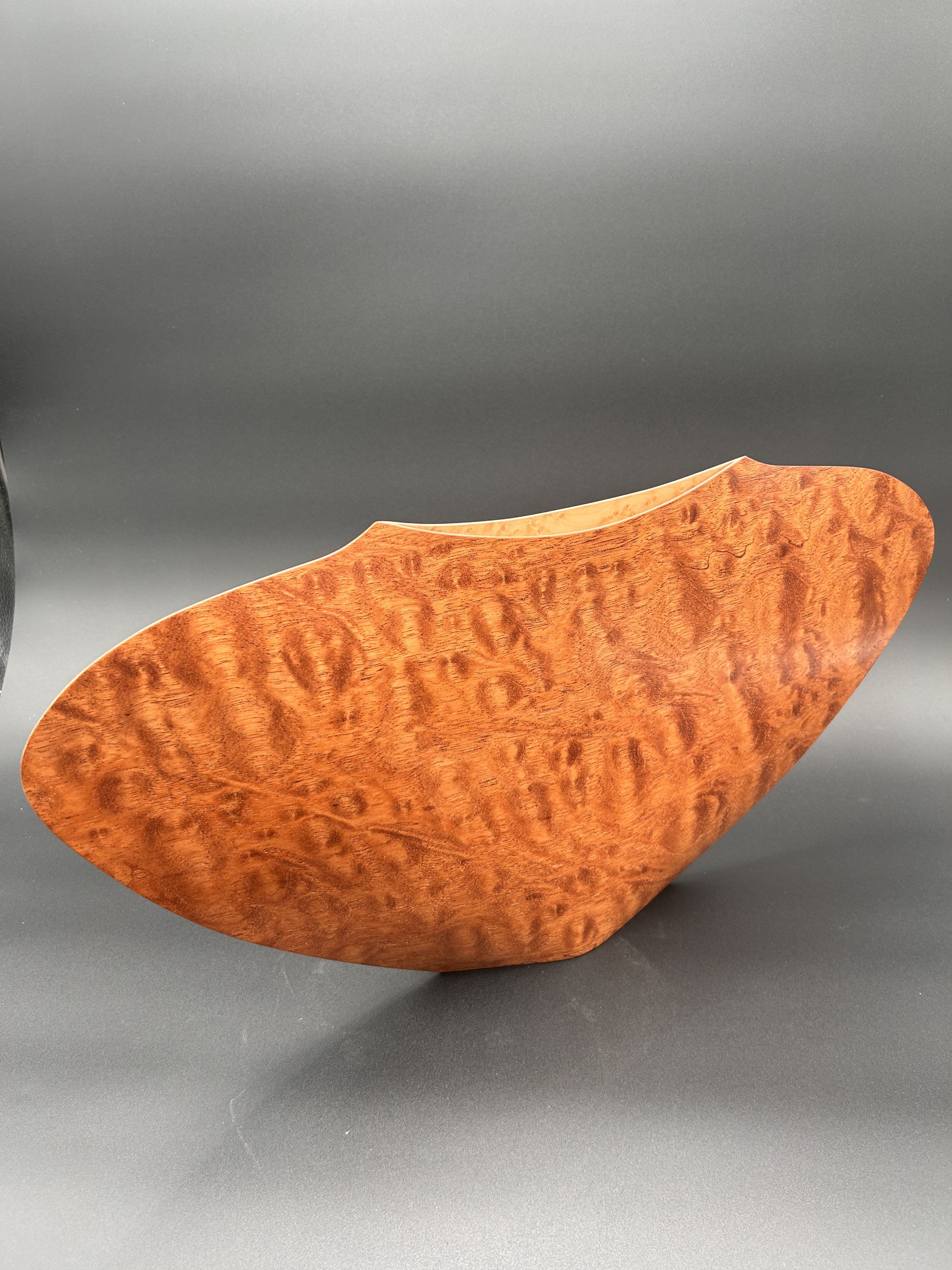 Schleeh Vase - Hand Crafted vase by the artist, Colin Schleeh. A stand alone piece or with fresh or artificial flowers. Yes, they hold water. 11 inches tall and 23 inches long. If interested please call the shop to speak with one of our designers.