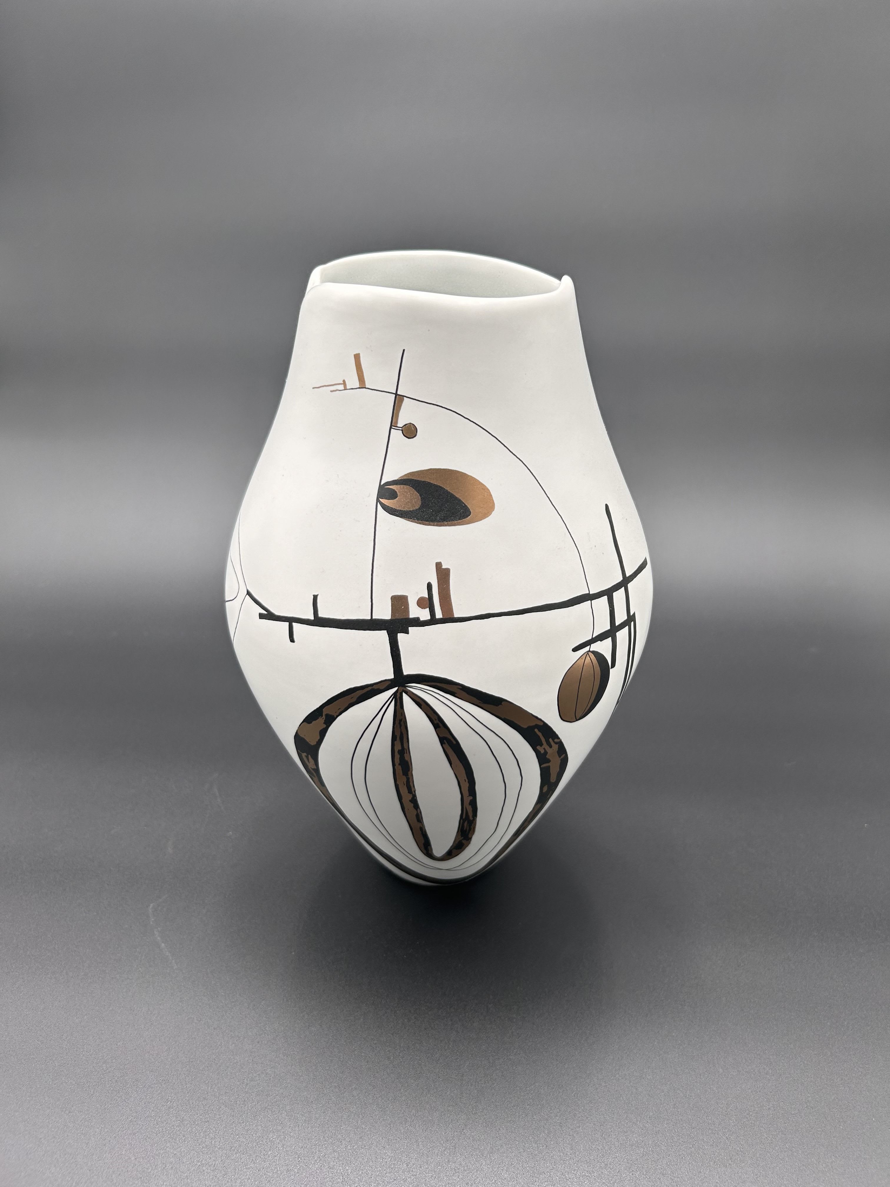 Ferra Vase - One of our stand-alone designer vases. Can be bought solo or with flowers. 10.5 inches tall with a 3.5 inch opening.