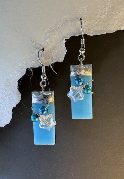 Light Aqua Blue Stained Glass Earrings - These gorgeous earrings are handmade in our shop in Harrisonburg, Virginia in the beautiful Shenandoah Valley!  We LOVE earrings that are light-weight, comfortable to wear, and the colors we use are amazing!  They are sparkly, feminine, and make wonderful add-on's to a floral bouquet of your choice!  The price includes shipping or delivery, and are available for wholesale purchasing.  Give us a call for additional information.