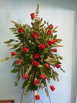 ELEGANT GOOD BYE - BEAUTIFUL MIX OF DIFFERENT GREENS AND RED ROSES TO STAND OUT ABOVE THE REST.