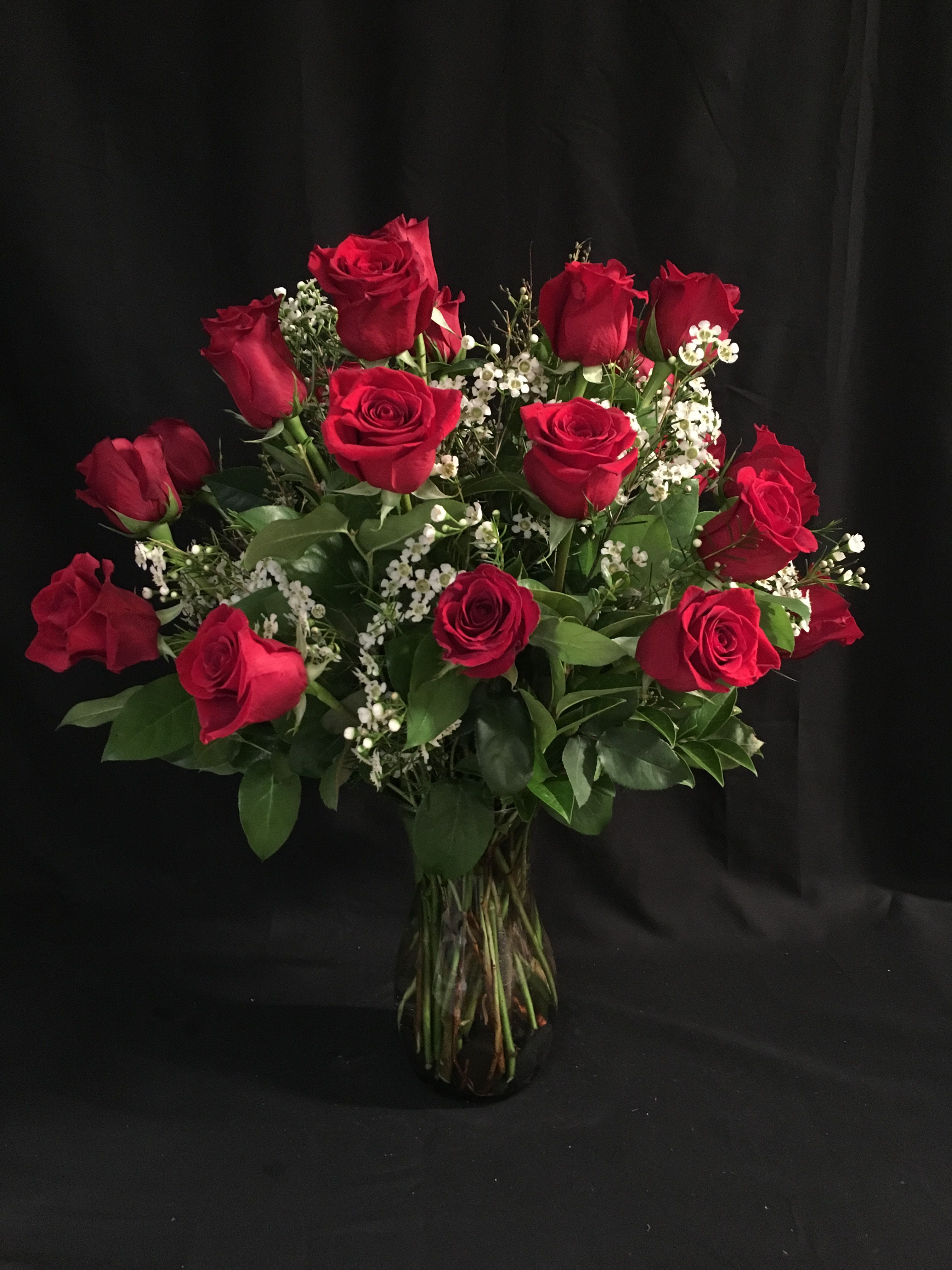 Endless Extra Love - 24 Gorgeous Red Roses in a beautiful glass vase