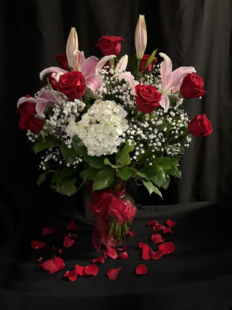 With all my love - A showstopper of a floral design to consist of one dozen roses, in addition to hydrangea, lilies and baby's breath