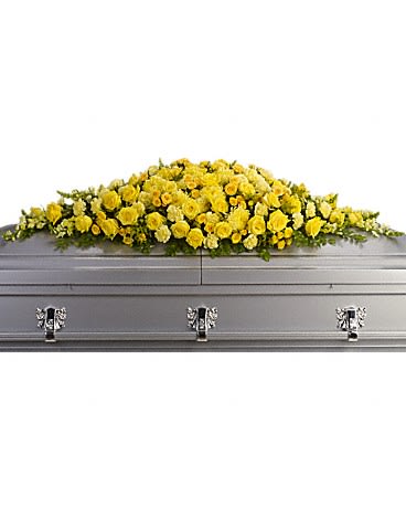 Golden Garden Casket Spray - In our darkest hours, a radiant display of sunshine is sure to warm hearts, especially when the sunshine is delivered in such a beautiful way. This spray offers an abundance of brilliant yellow blossoms. Sunny yellow roses, spray roses, carnations, chrysanthemums, snapdragons and more are arranged in a dazzling full casket spray.