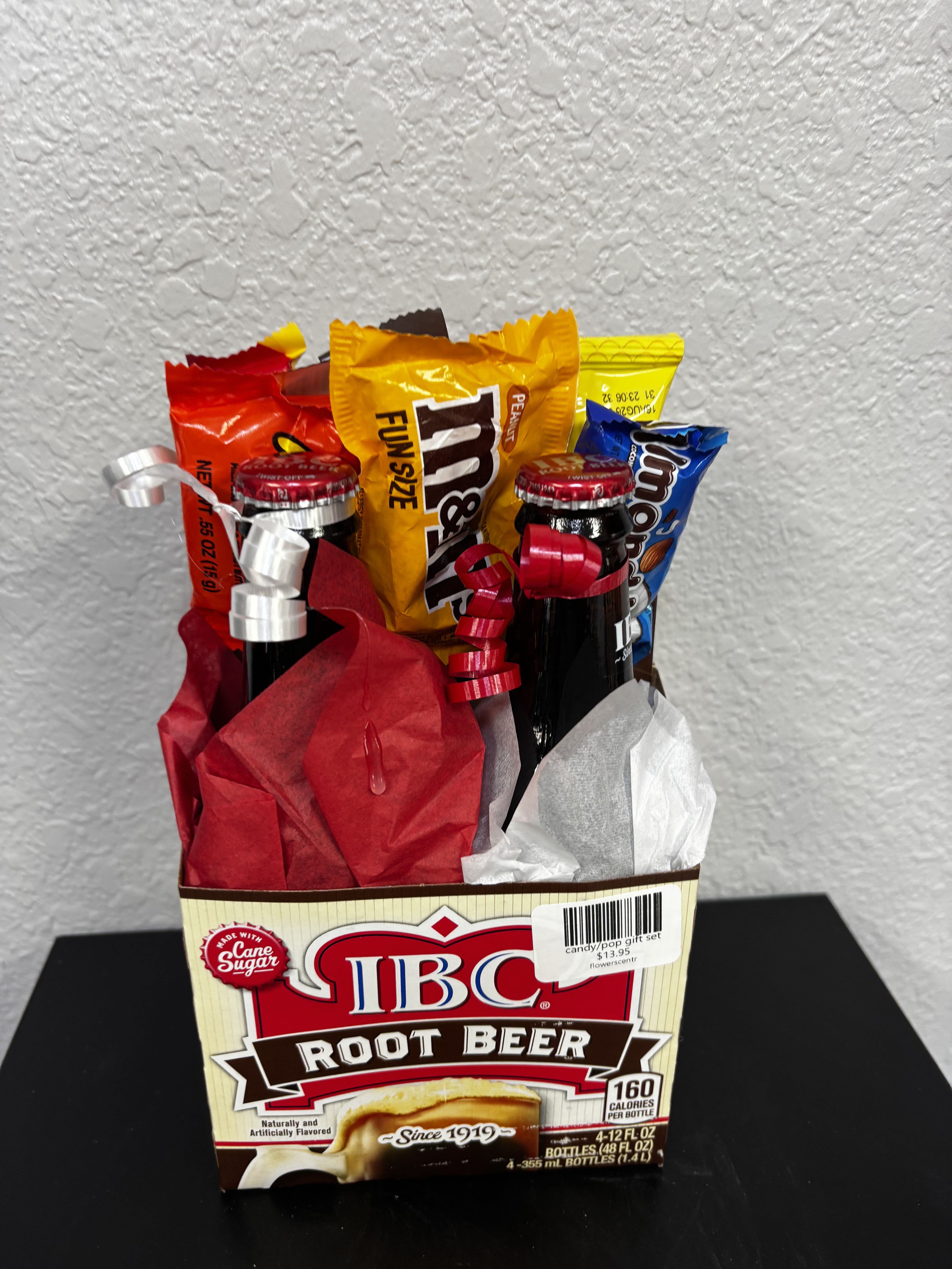 Root beer Candy /Pop Gift Set - A timeless treat with old-fashioned flavor! This gift features rich, smooth IBC Root Beer paired with a delicious assortment of candy favorites like M&amp;M’s, Almond Joy, Reese’s, and more. Beautifully wrapped and ready to gift, it’s perfect for birthdays, thank-you gifts, or just because.