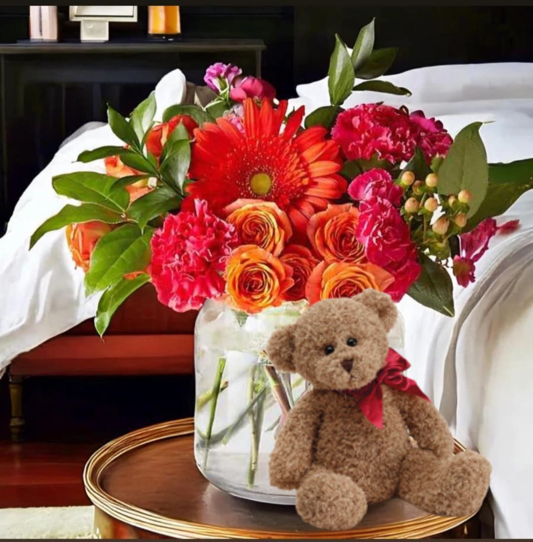 Mother’s Day Treat Combo - Mom deserves everything in the world! Celebrate her special day with one of these fresh and vibrant arrangements. This combination includes a fresh floral arrangement in a clear vase* and an adorable plush teddy bear**. Don't forget to add a box of delicious chocolates for a sweet Mother's Day Treat!    *Please note, due to an increase in demand and flower availability, we may substitute flowers or colors to fulfill your order. The overall look and feel will be preserved.  **Please note, plush teddy bear may differ from what is depicted. BLOOM DETAILS - A Mix Vibrant Spring Flowers filled to value 