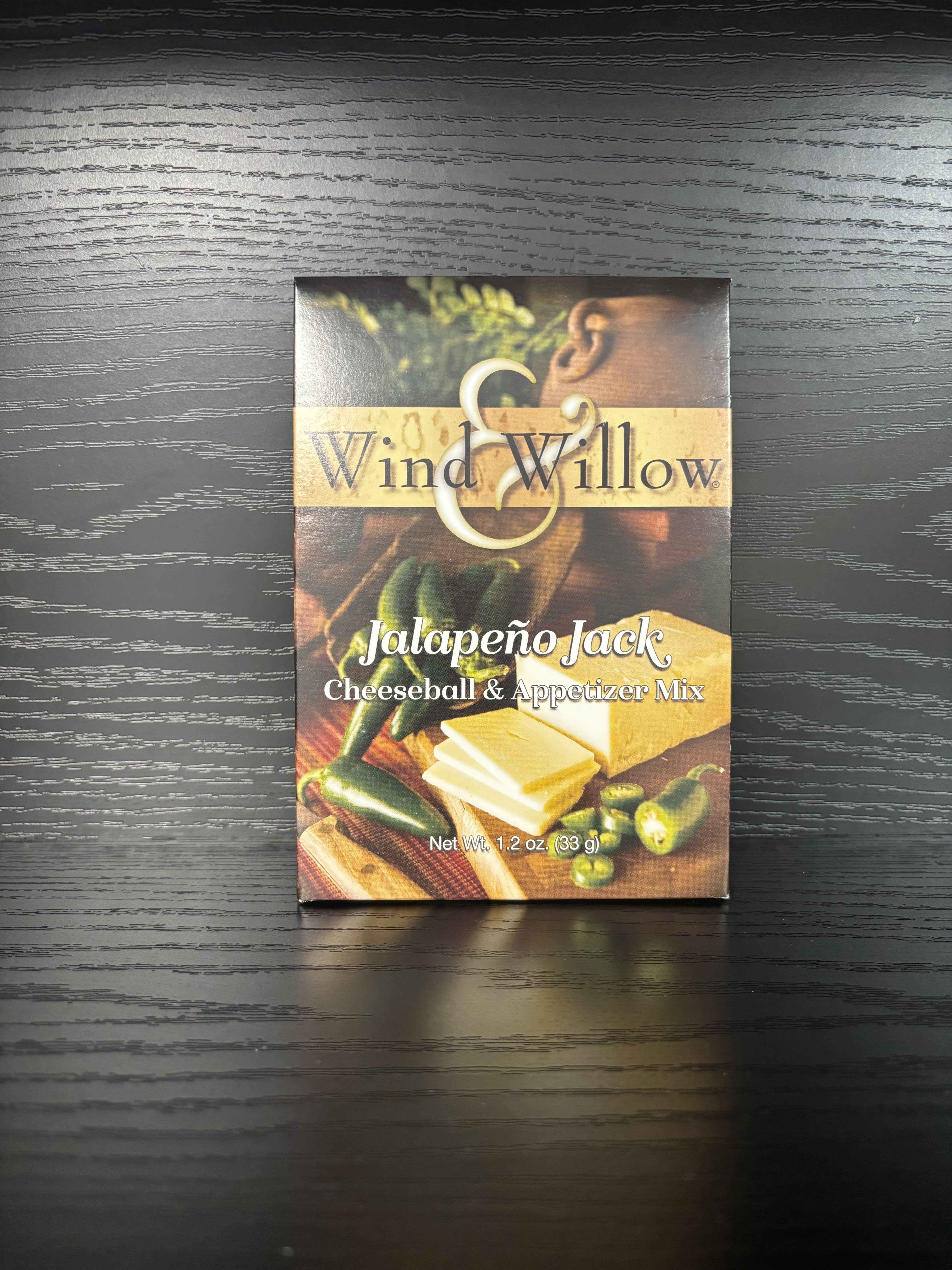 Jalapeño Jack Cheeseball &amp; App Mix - Turn up the heat with Wind &amp; Willow’s Jalapeño Jack Cheeseball &amp; Appetizer Mix! This bold blend combines the creamy smoothness of Monterey Jack cheese flavor with the lively kick of fresh jalapeños for a spicy, crowd-pleasing favorite.  Perfect for parties, tailgates, or casual get-togethers, it can be made into a zesty cheeseball, creamy dip, or flavorful spread. Serve it with crackers, tortilla chips, or veggies for an appetizer that delivers just the right amount of heat.