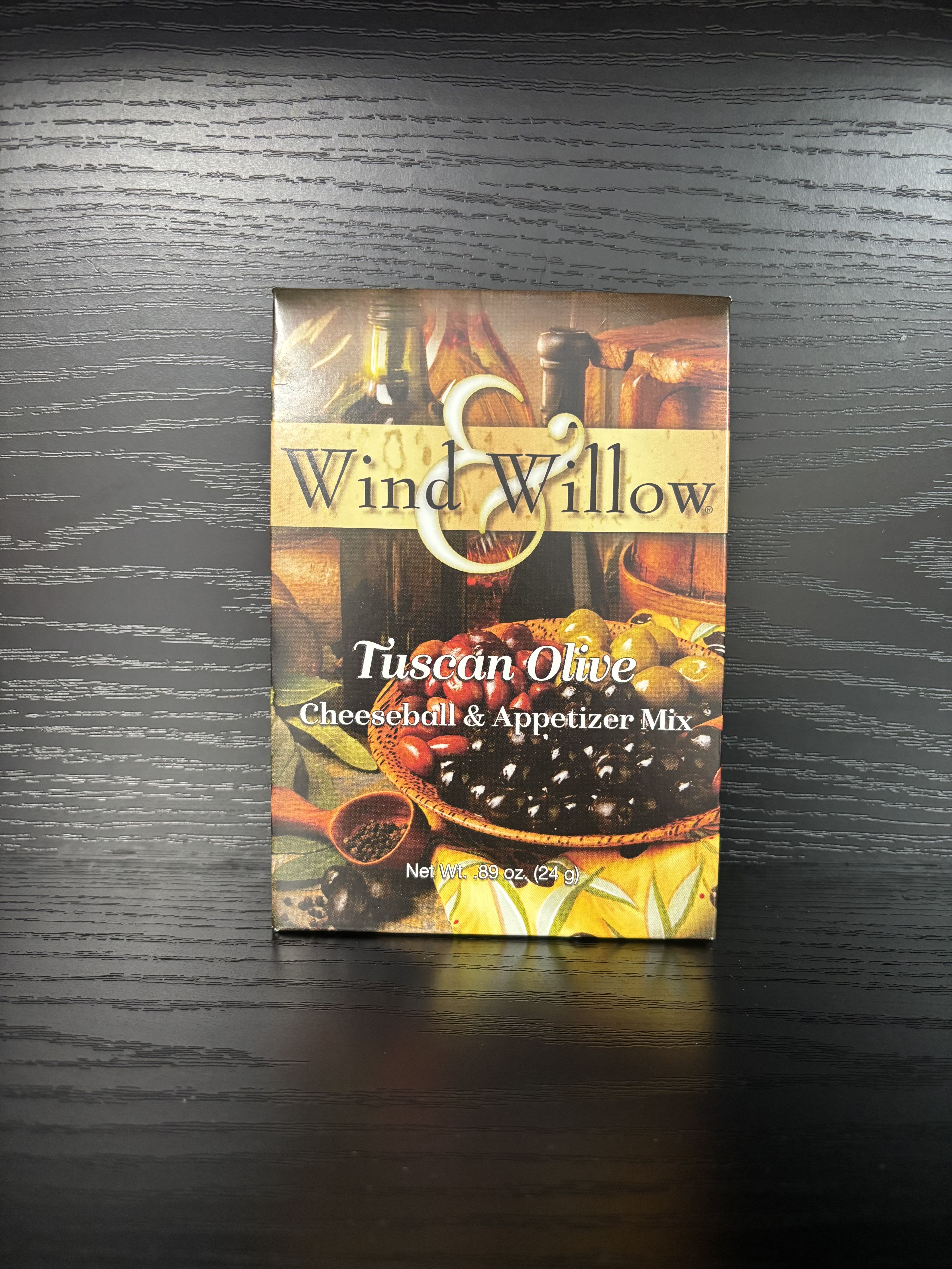 Tuscan Olive Cheeseball &amp; App Dip Mix - Bring a touch of the Mediterranean to your table with Wind &amp; Willow’s Tuscan Olive Cheeseball &amp; Appetizer Mix. Bursting with the bold, savory flavors of sun-ripened olives, herbs, and spices, this mix creates an elegant and irresistible appetizer in minutes.  Perfect for entertaining or a cozy night in, it can be prepared as a classic cheeseball or transformed into a creamy dip or spread. Pair it with crackers, warm bread, or fresh vegetables for a sophisticated bite inspired by the Italian countryside.