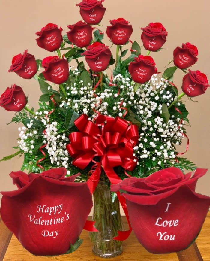 Valentine's Day Combo Roses - 12 long stem roses each individually rose personalized with the message as shown (6 roses ,,I Love You'' + 6 roses ,,Happy Valentine's Day''), will arrive arranged in a glass vase, greens, filler, and bow. VIP Floral Designs uses only the highest quality roses. 