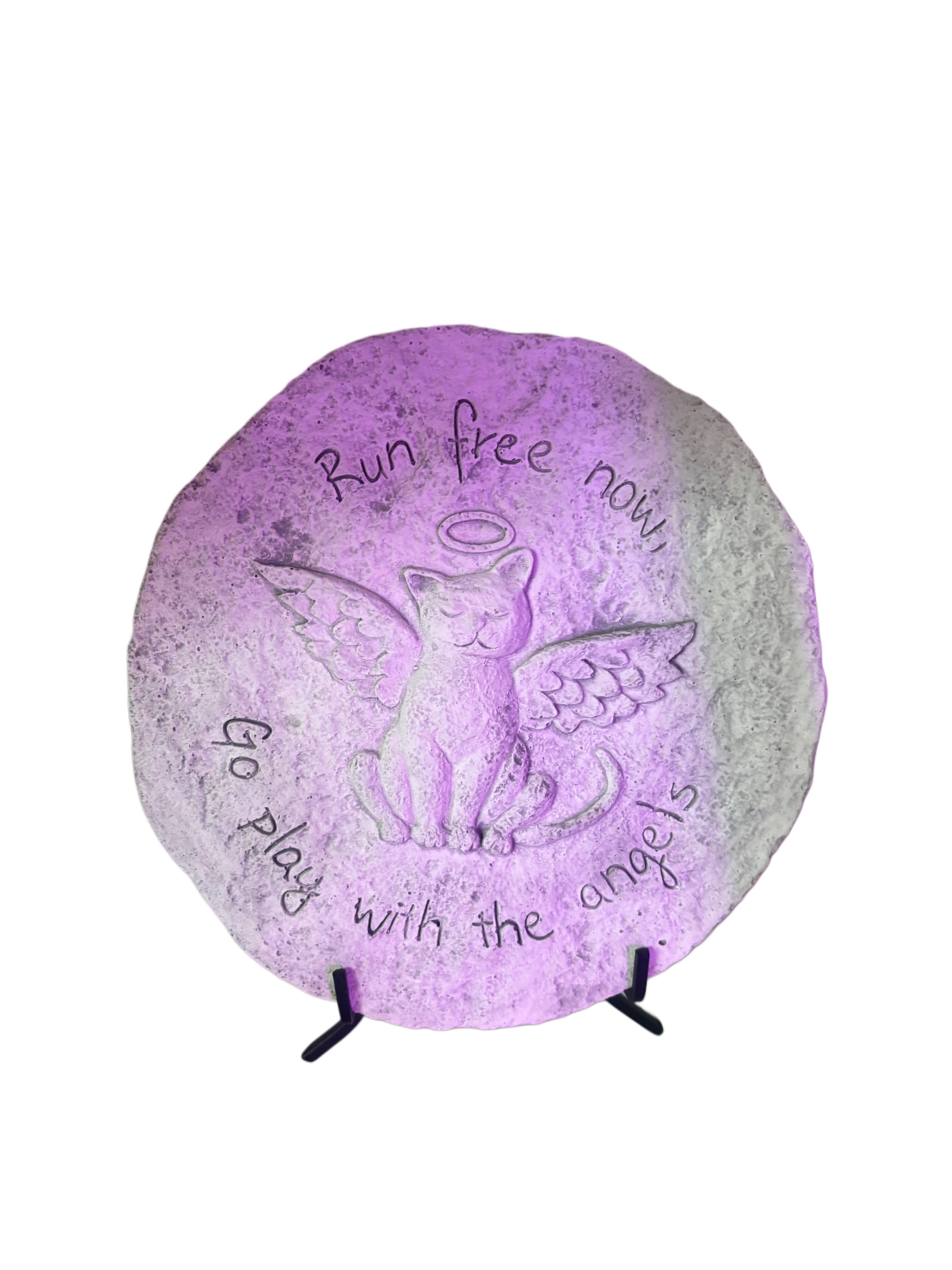 Pet Angel Memorial Stone - A touching tribute for a beloved pet, this round memorial stone features a engraved image of a winged cat with a halo, the heartfelt words, "Run free now, go play with the angels." Made to resemble a natural stone it serves as a beautiful reminder of the unconditional love your furry friend brought to your life. Perfect for garden memorial or indoor as a remembrance display.