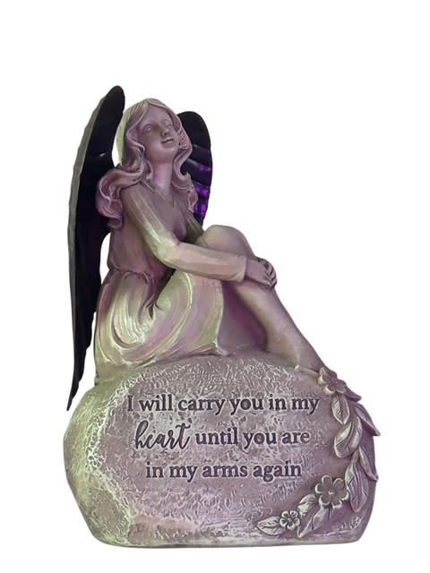 Angel Of Remembrance Figurine - A beautiful memorial angel figurine featuring a serene angel with dark wings, sitting gracefully on a stone base. The base is inscribed with the heartfelt message, “I will carry you in my heart until you are in my arms again.” Perfect as a sympathy gift or graveside tribute, this piece offers comfort and peace, symbolizing eternal love and remembrance.