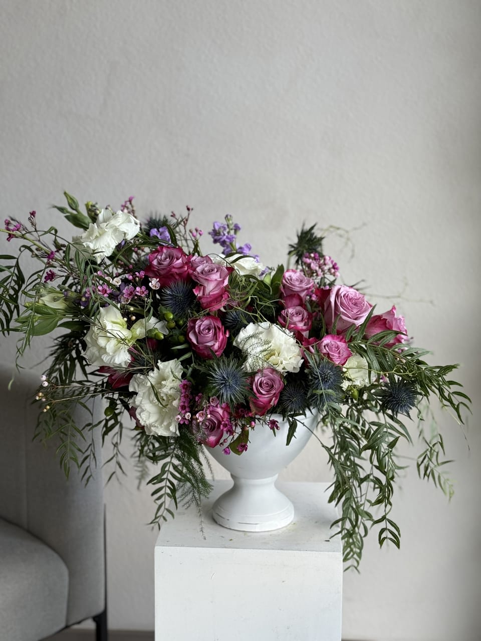 Violet Twilight Bouquet - Welcome to our floral sanctuary, where the Violet Twilight Bouquet awaits. This exquisite arrangement features deep purple roses, thistles, and lisianthus. The deep purple roses bring a touch of mystery, thistles add a rugged elegance, and lisianthus contribute a soft, dreamlike quality. Perfect for expressing love or marking a special moment, the Violet Twilight Bouquet is a captivating blend of sophistication and natural beauty. Order now to bring this enchanting floral poetry into your space.