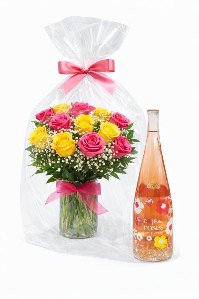 Rosé &amp; Roses Gift Set - Make any moment feel extra special with this gorgeous Rosé &amp; Roses Gift Set! Featuring a fresh vase arrangement of pink and yellow roses accented with baby’s breath and lush greens, paired with a bottle of Côté des Roses Rosé, this gift is wrapped together in clear cello and finished with a beautiful pink bow for the perfect presentation.   Includes: • 12 fresh roses (pink &amp; yellow) • Baby’s breath + mixed greenery • Glass vase • Bottle of  Côté des Roses Rosé • Wrapped in cello with a pink bow  Perfect for Valentine’s Day, birthdays, anniversaries, or a “just because” surprise! 