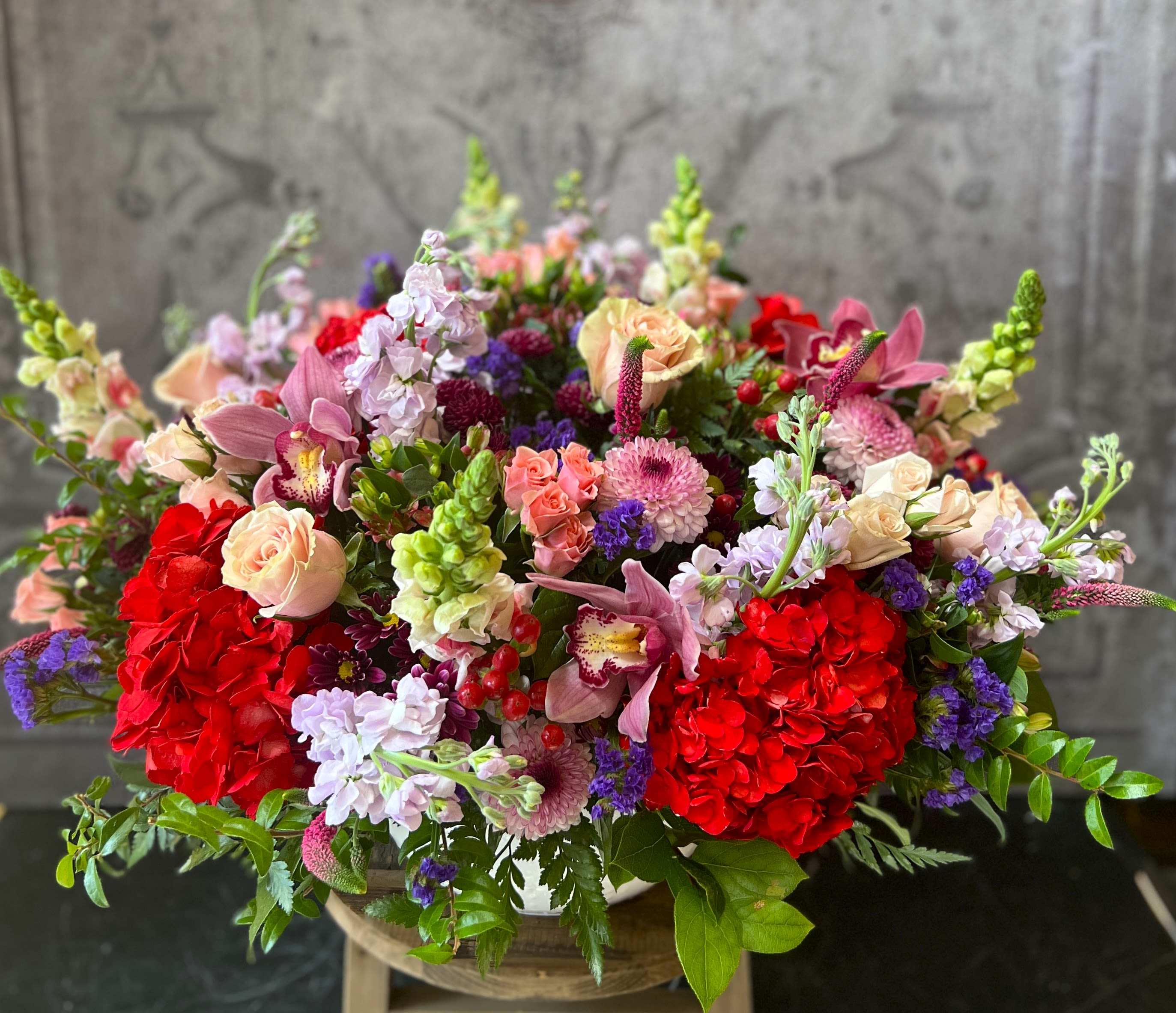 Cupid's Garden - Make a statement this Valentine's Day with this Stunning arrangement that would make Cupid very proud!