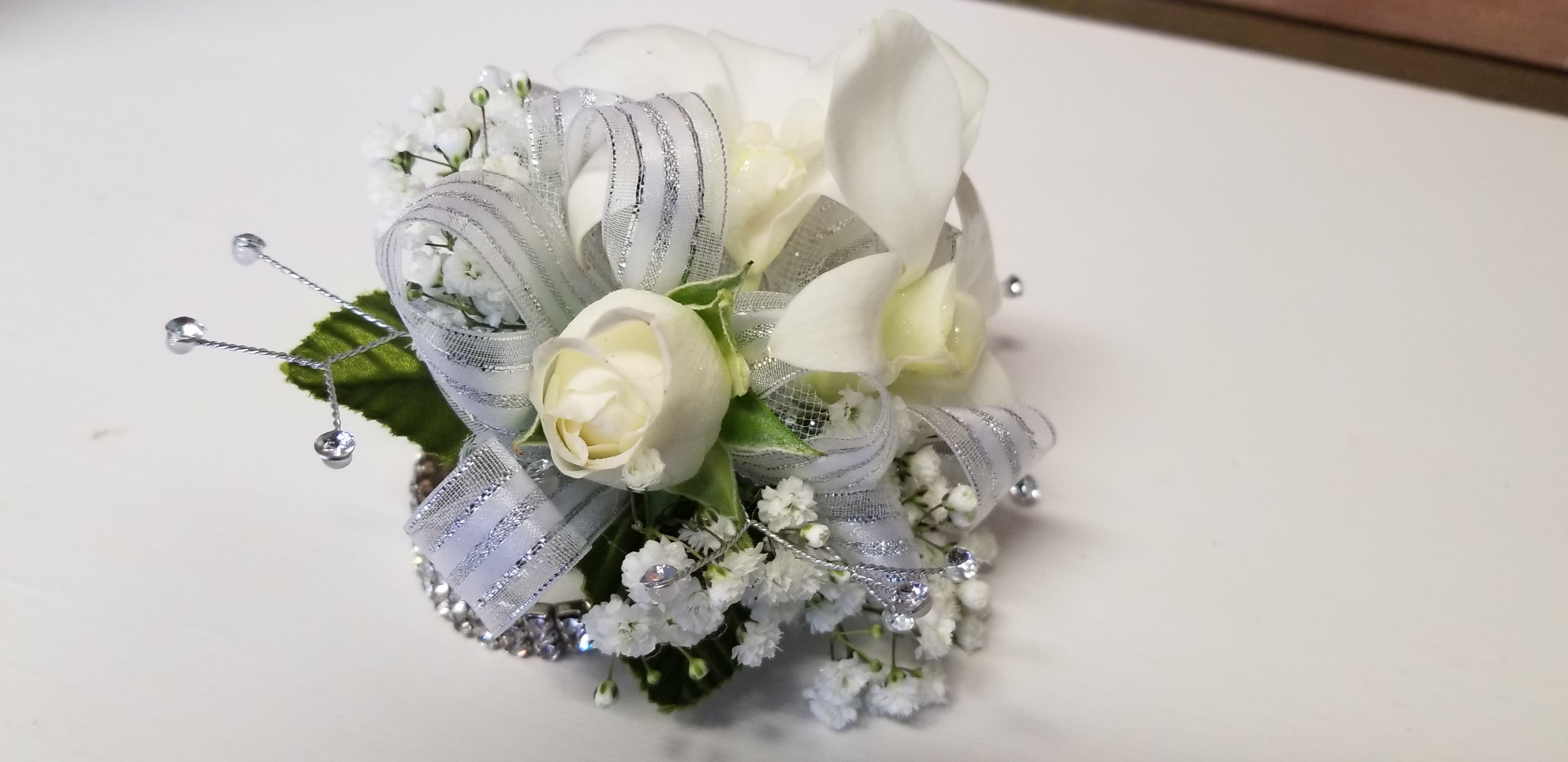 Rose,  Orchid &amp; Baby's Breath - *ALL ORDERS MUST BE PLACED 30 DAYS IN ADVANCE FOR WEDDINGS…1 WEEK FOR PROM *Love this design, but, looking for different colors.  There is typically no cost difference involved in adjusting colors.  Simply e-mail us letting us know what colors you have in mind and we can confirm availability before your order is placed. * Indicate Pin On or Wrist Corsage in Florist Instructions When Checking out