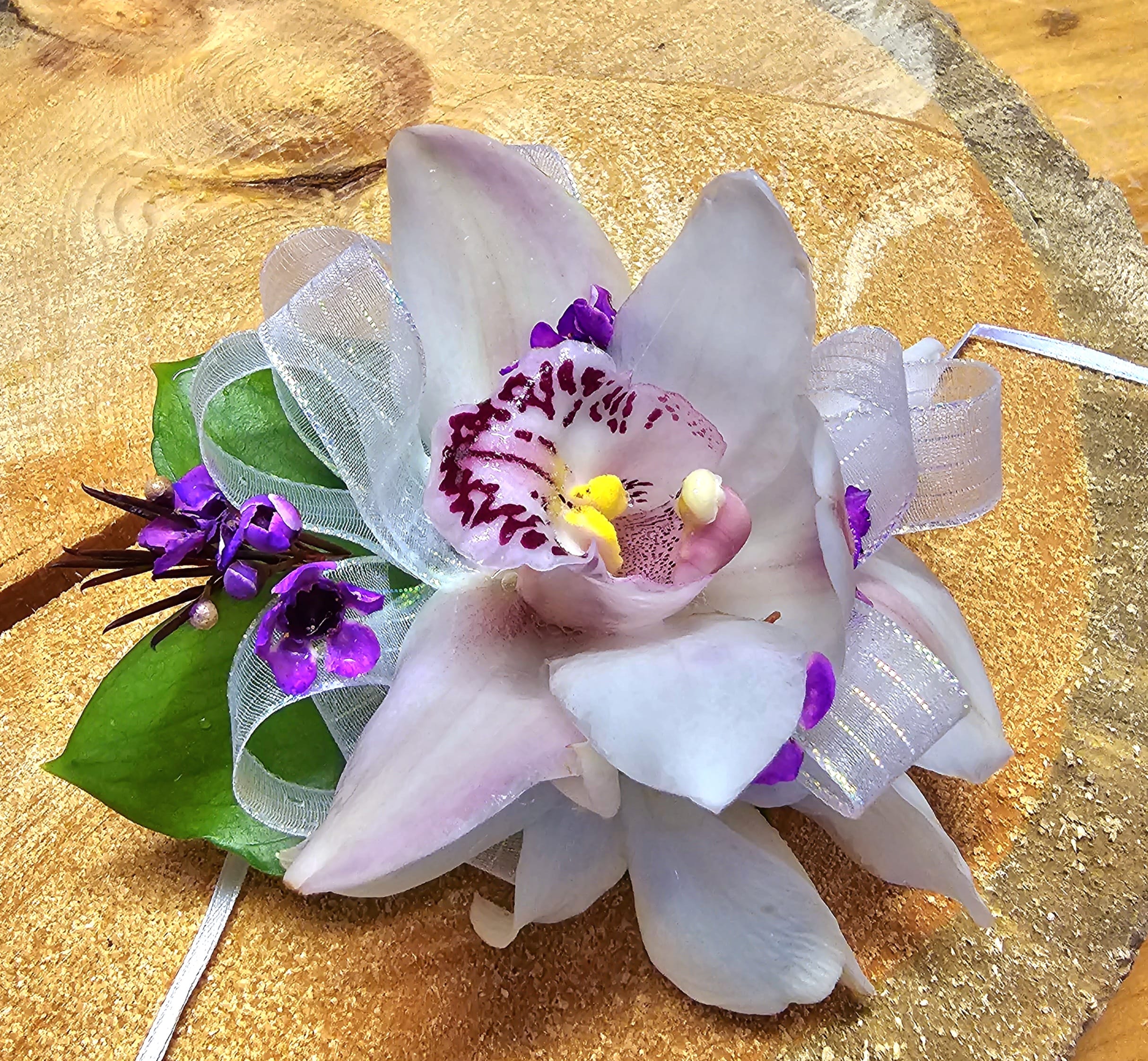 Cymbidium Orchid - 3 DAYS FOR PROM *Love this design, but looking for different colors.  There is typically no cost difference involved in adjusting colors.  E-mail us what colors you have in mind so we can confirm availability before your order is placed. * Indicate Pin On or Wrist Corsage in Florist Instructions When Checking out