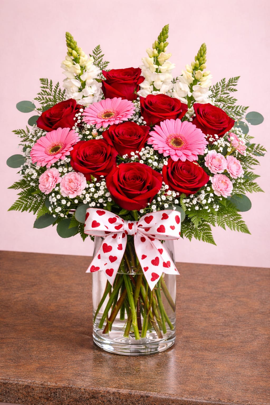 Blooming Hearts! - A gorgeous arrangement with roses, gerbera daisies, snap dragons, carnations, eucalyptus and more!
