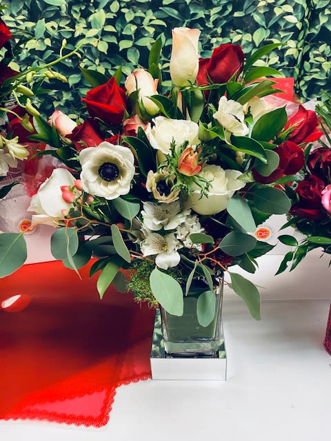 Love Letters with FREE Floral Gift Wrap and Personalized Card - Love Letters... a step above the classic one dozen red roses, this red/white Roses and Anemones combination delivers quite a fancy, unforgettable flair, making her day all the more memorable.