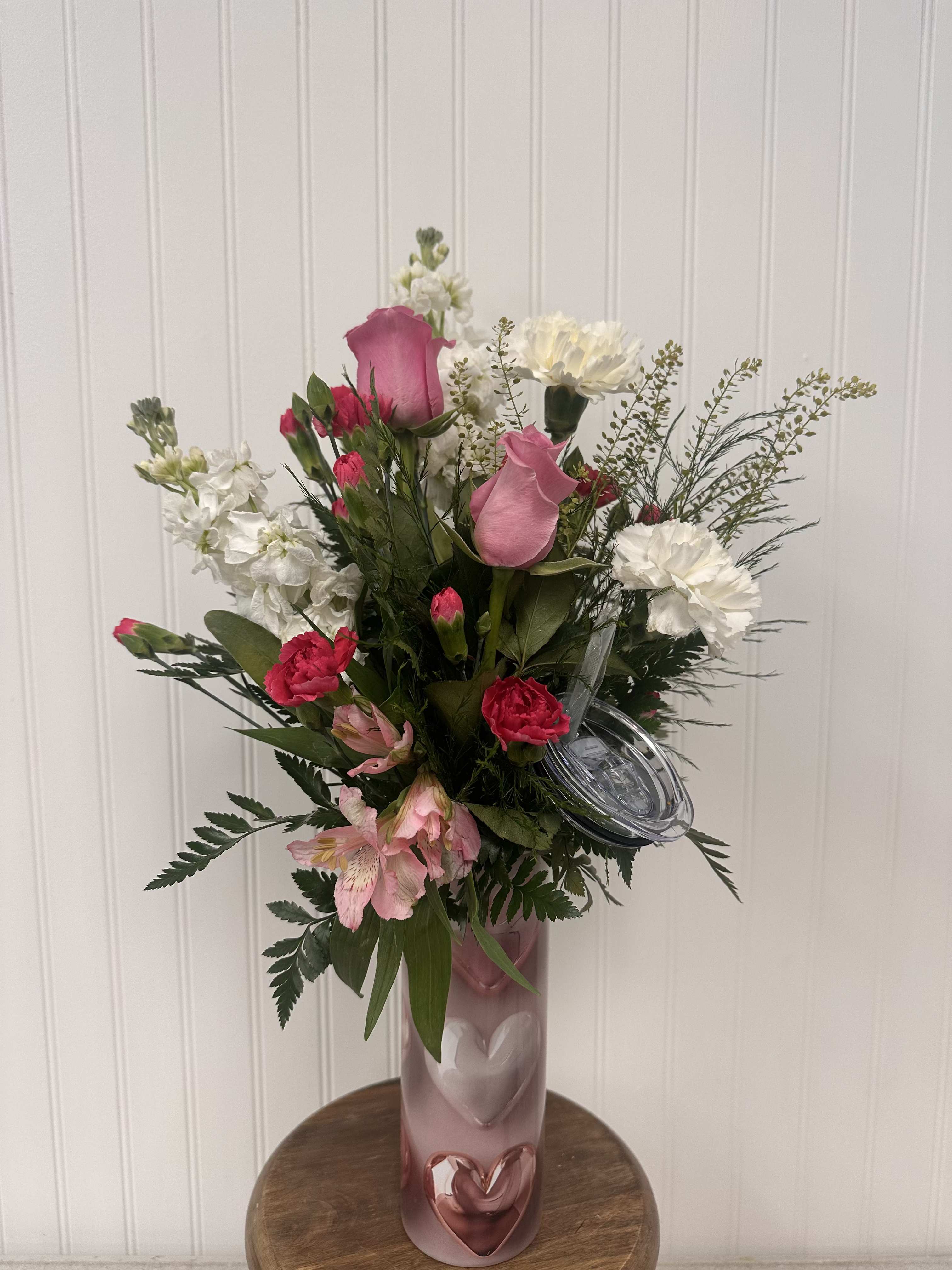 Valentine's Heart Tumbler 20 oz. - 20 oz. hot/cold tumbler with Valentine's Day flowers. This is a wonderful gift within a gift. Flower choice and color are subject to substitution. 