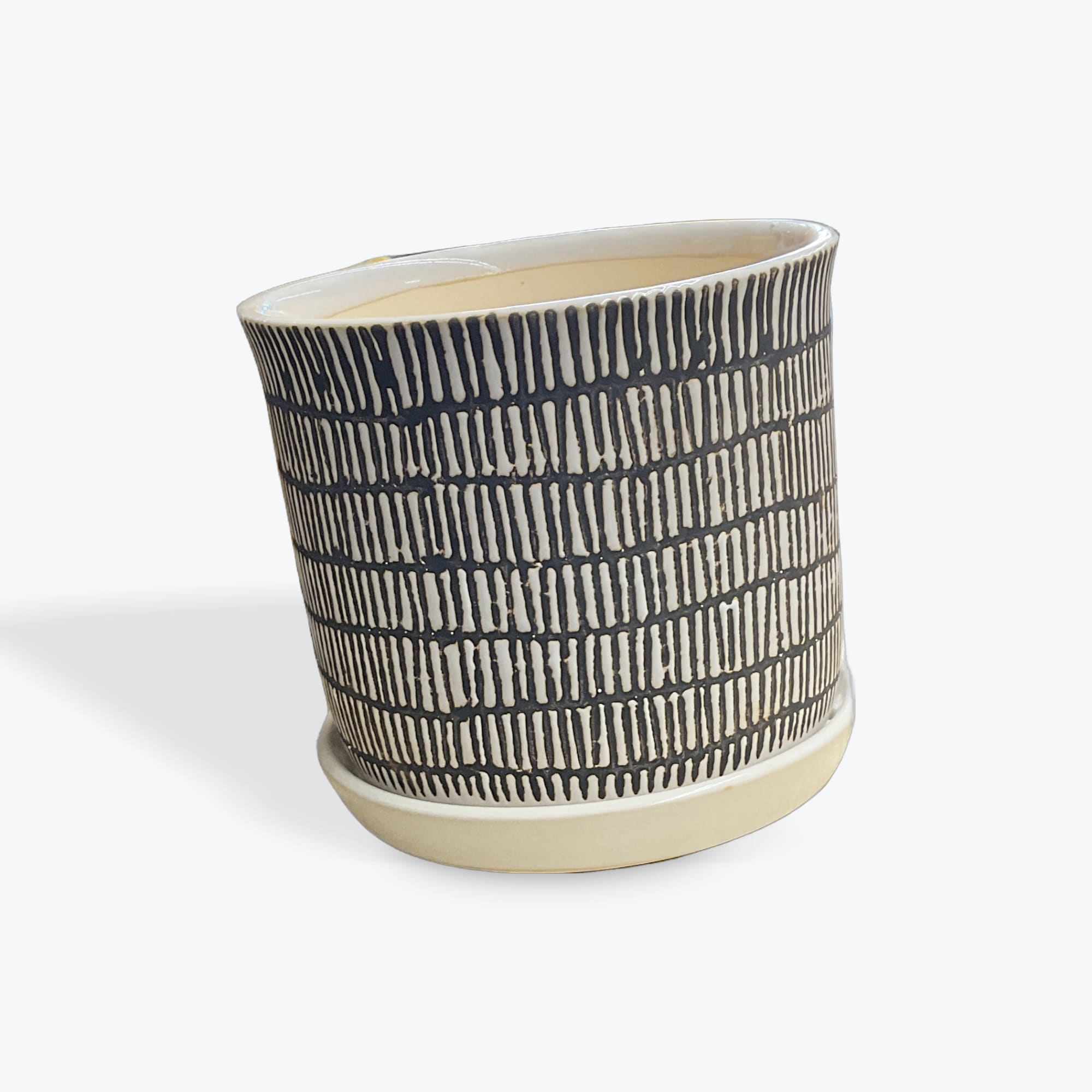 6inch Ivory Ceramic Line Pot with Saucer - Each planter includes an attached saucer that helps control water and protect surfaces, creating a cleaner planting setup.
