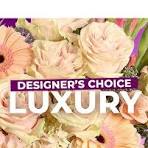 Luxury Designer Choice - Over the top, Exquisite, Truly one of a kind - are we talking about flowers or that special someone? Either way we can create that special look that speaks volumes. Give a gift of flowers that says WOW! Our designers will create something truly special. Delivery in Kissimmee, delivery in St. Cloud or delivery in the disney area only