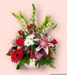 Love's Best Garden - When you can't decide what to send but you want the best, this designer choice creation will always make her happy.  the flowers for this design are hand chosen by our designers from the large assortment flowers we have daily that is sure to please.  Make that special someone in Kissimmee, St. Cloud or the Disney resort area smile.