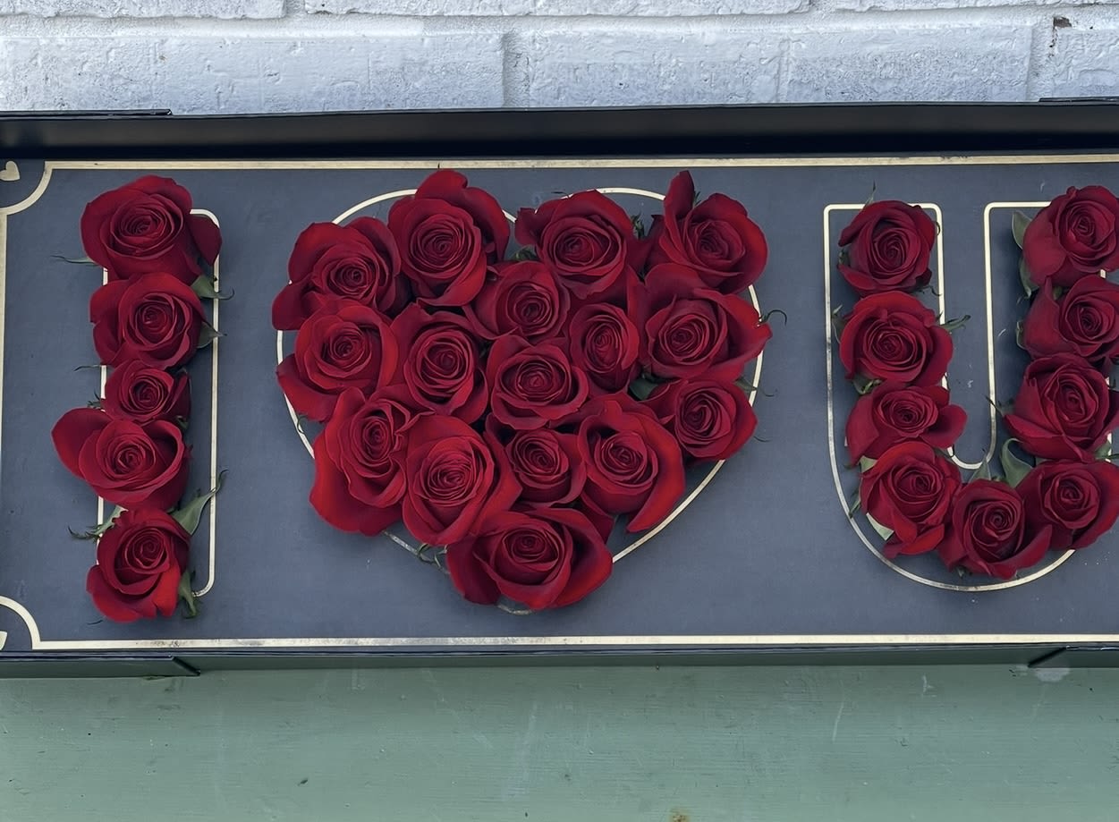 I love you box  - 24-30 red roses or multi color in a box that says I love you 