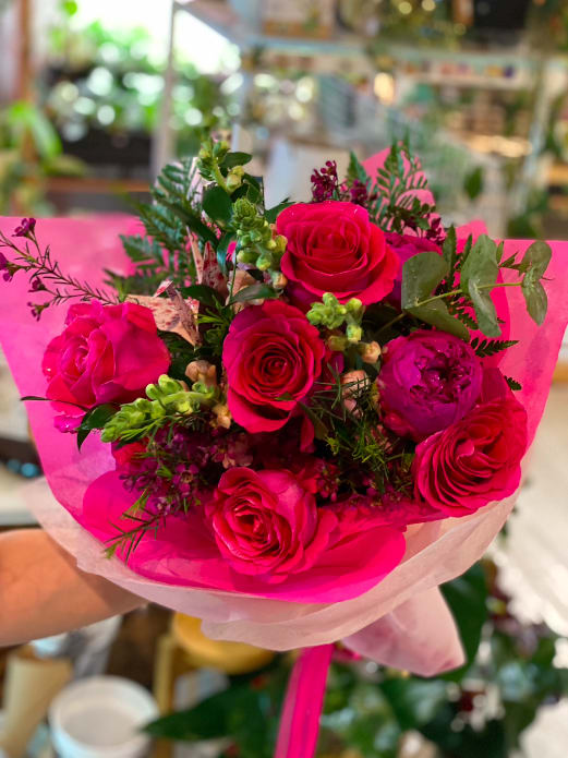 Valentine's Roses with Seasonal Blooms - Pink roses with seasonal flowers for a modern twist on a traditional Valentine's Day bouquet. 