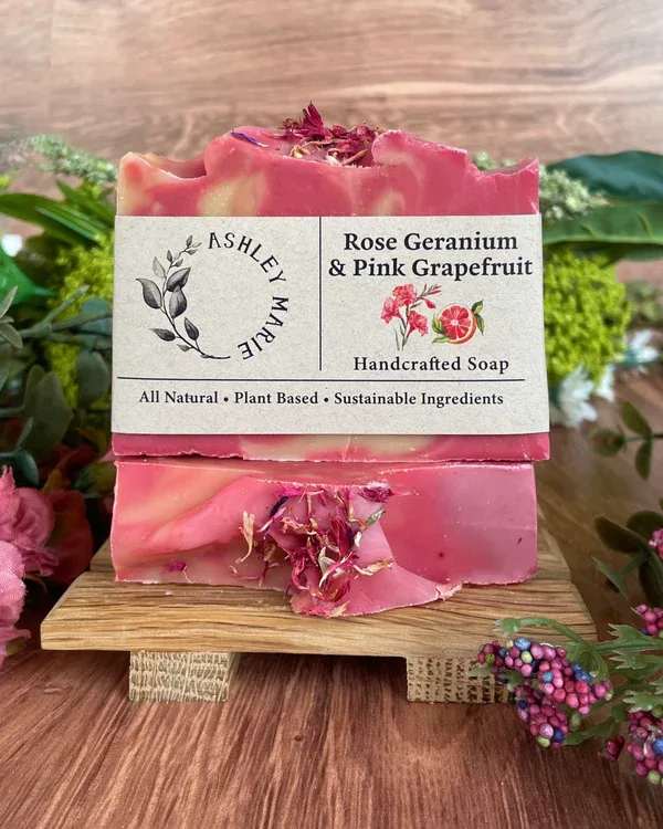Rose Geranium &amp; Pink Grapefruit Soap - A delightfully floral and citrusy bar made with kaolin clay to gently coax excess oil from the skin without over-drying, and is known to improve skin elasticity and cell renewal. Infused with Rhubarb to give it a beautiful dark pink color that also has skin-cleansing properties to leave a smooth glow. Smells like a sumptuous bouquet of fresh roses &amp; juicy grapefruit!