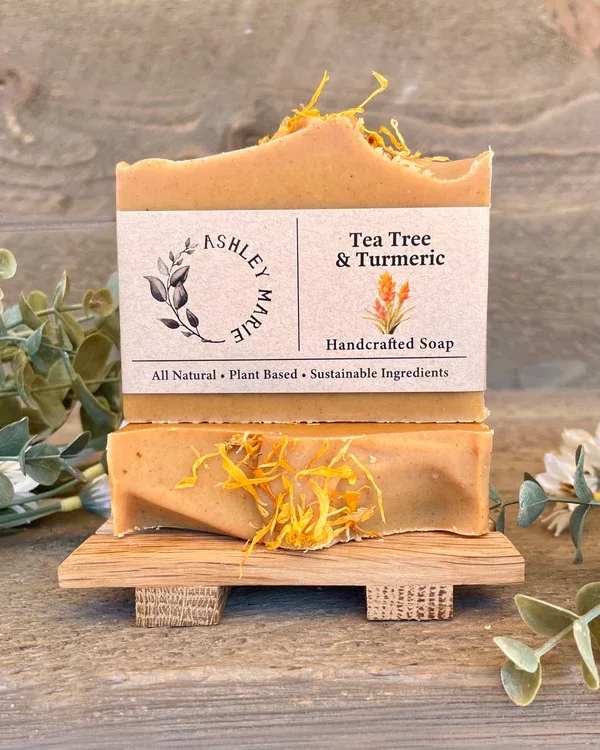 Tea Tree &amp; Tumeric - This cleansing and brightening bar soap is so healing for the skin. Tea Tree essential oil is antiseptic, anti-inflammatory, and antimicrobial helping to reduce bacteria caused odor, dry skin, psoriasis, eczema, and acne and Turmeric works to brighten the skin and diminish discoloration. It also boosts the properties of the Tea Tree oil making it a great bar for any kind of troubled skin or just to improve your skins radiance. 