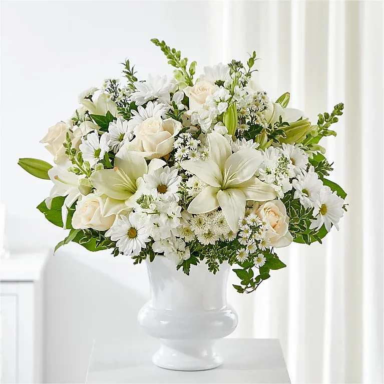 Uplifting Urn Arrangement - Lift them up with love and support when they need it most. This arrangement is beautifully suited for a memorial or service.