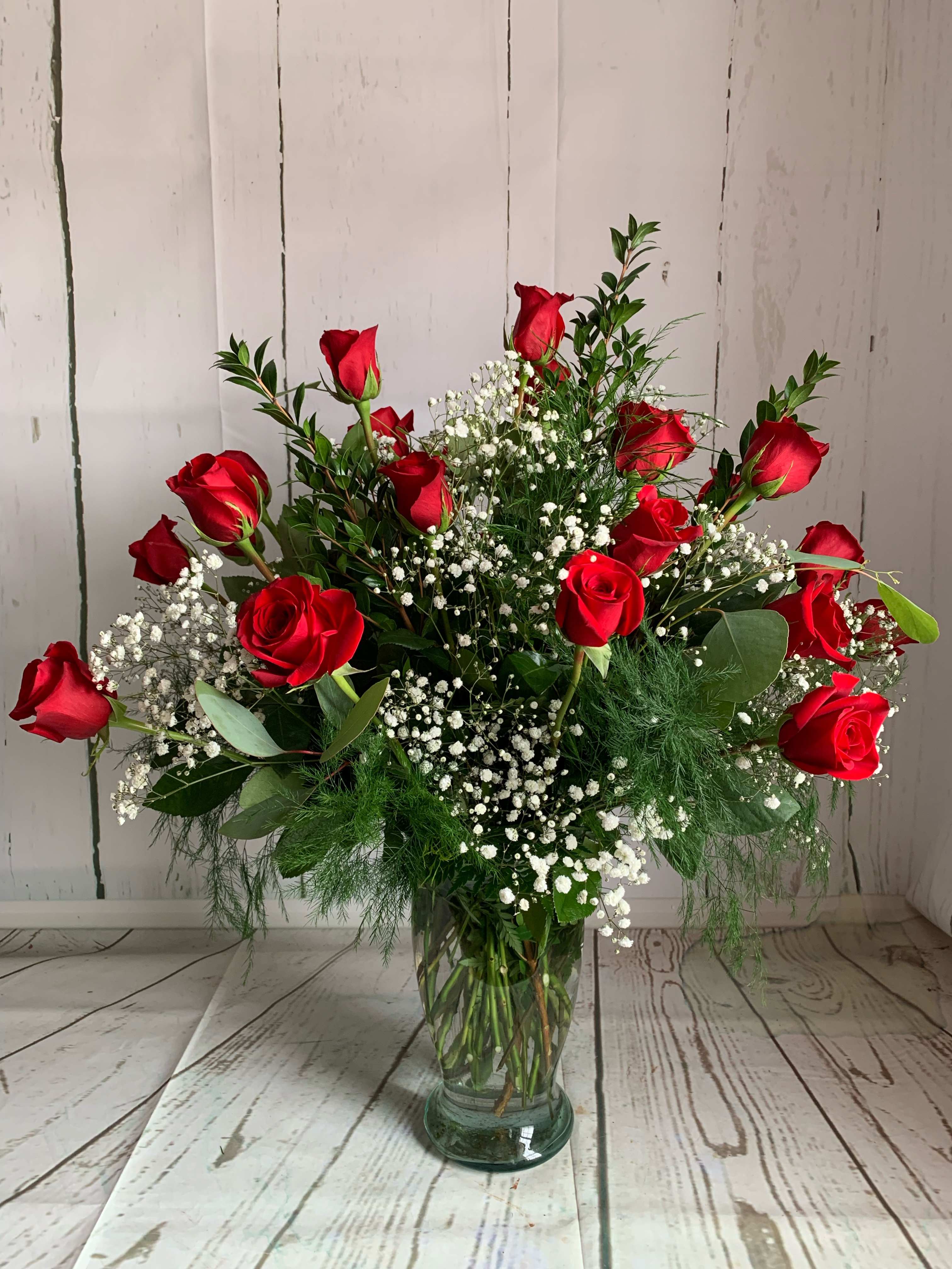 Two Dozen Roses - Michaleen's classic two dozen roses.  *Please call us at 607-257-3203 to request a dozen in another color. We can accommodate most requests with at least 24 hours' notice &amp; always carry other colors in stock!