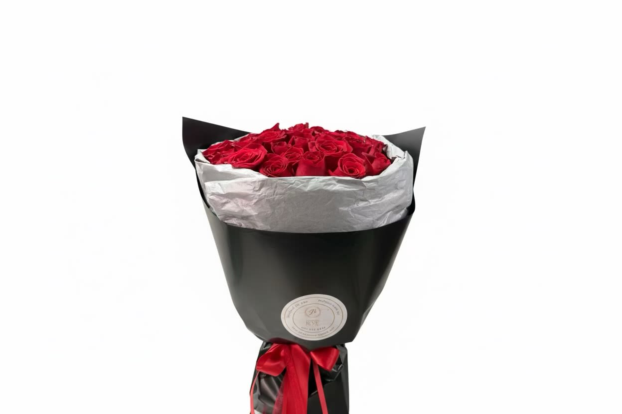 Midnight Red Roses Wrap - A striking hand-wrapped bouquet of premium red rose stems, finished in sleek black paper with elegant details. Bold, modern, and timeless—perfect for romantic gestures and unforgettable moments.  Substitution &amp; Design Policy   AS SIMILAR AS POSSIBLE   Each floral arrangement is custom-designed and handcrafted using the freshest flowers, containers, decorative accents, and materials available at the time of creation. Due to seasonal availability, immediate inventory conditions, market limitations, or unforeseen circumstances, substitutions of flowers, containers, or decorative elements may be necessary. When substitutions occur, they will always be made with items of equal or greater value, while preserving the original arrangement's style, color palette, proportions, and design integrity. The final product will be delivered as similar as possible to the design shown. By placing an order, you acknowledge that all floral designs are unique and that natural variations are inherent to the artistic, handcrafted process. Our commitment is to deliver the most beautiful and refined version of each arrangement, consistent with our quality standards.