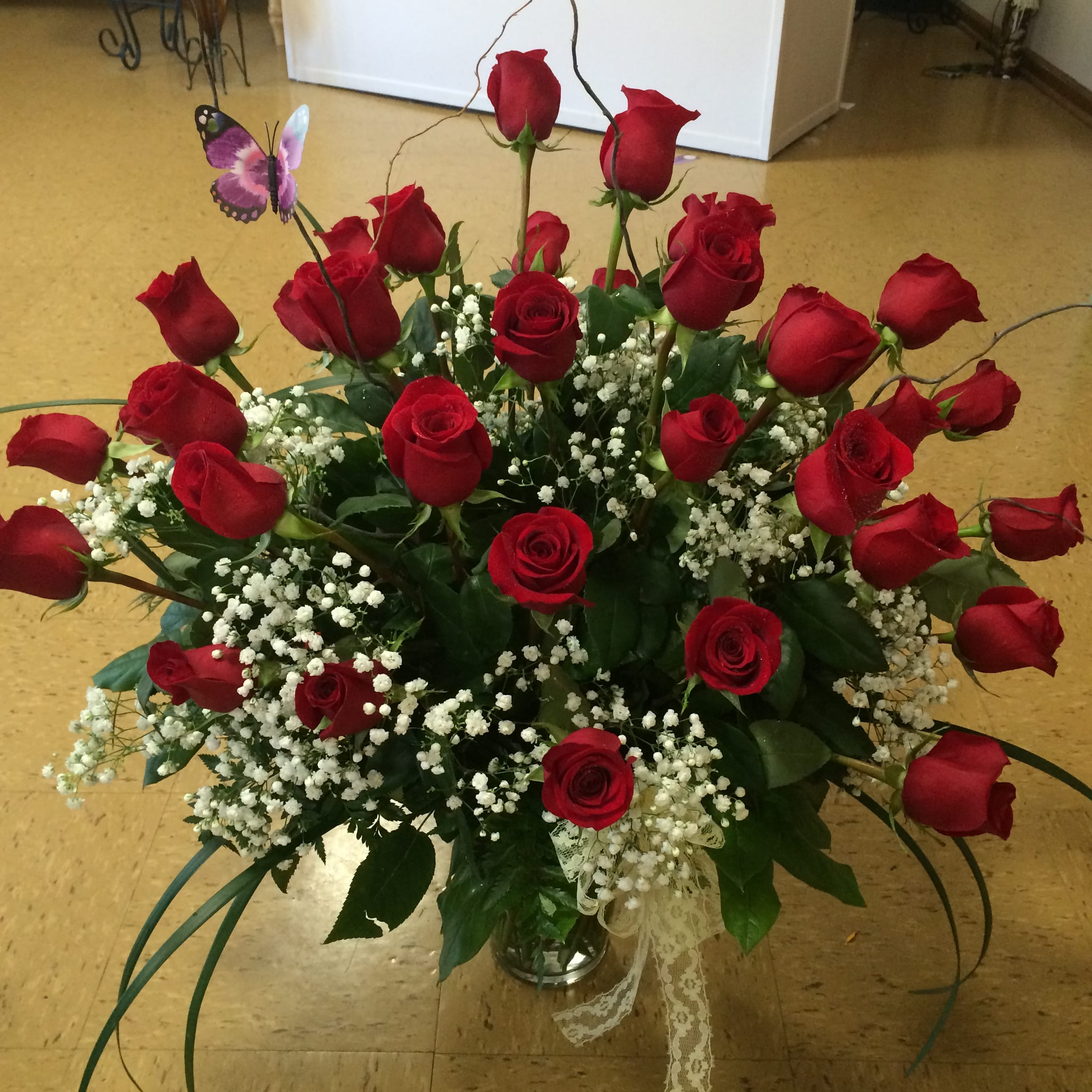 3 Dozen Roses Galore - 3 dozen roses, available in almost any color. In a vase with upgraded greenery and filler and curly willow.