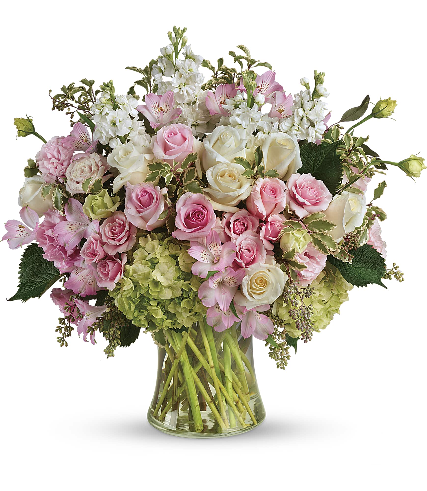 WCF Luxe Collection - Most Beautiful Love - Simply beautiful and breathtaking just like your love! Celebrate your feelings with this extraordinary bouquet of pink and white roses, accented with delicate greens and arranged in a graceful glass vase.  This breathtaking bouquet features green hydrangea, pink roses, white roses, pink spray roses, light pink alstroemeria, pink lisianthus, white stock, pittasporum, and seeded eucalyptus. Delivered in a large gathering vase. Approximately 25 1/2" W x 21" H  Please note that orders must be placed a least 48 hours prior to fulfillment date in order to procure the freshest and highest quality blooms. 
